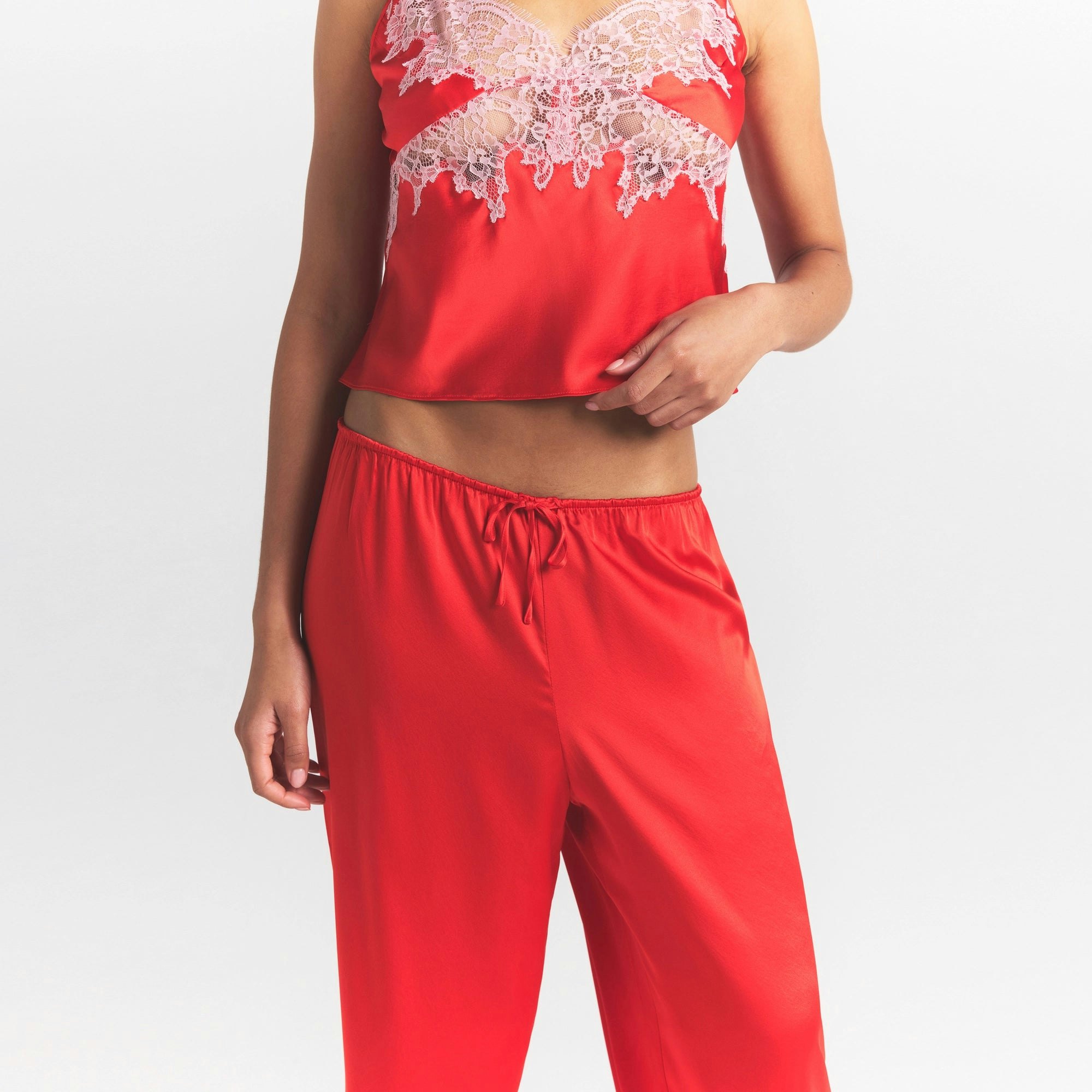 SILK LACE PANT | RUBY CONTRAST ON A MODEL SIDE VIEW @ | FOCUS: 0.0, 1.0, 0.9
