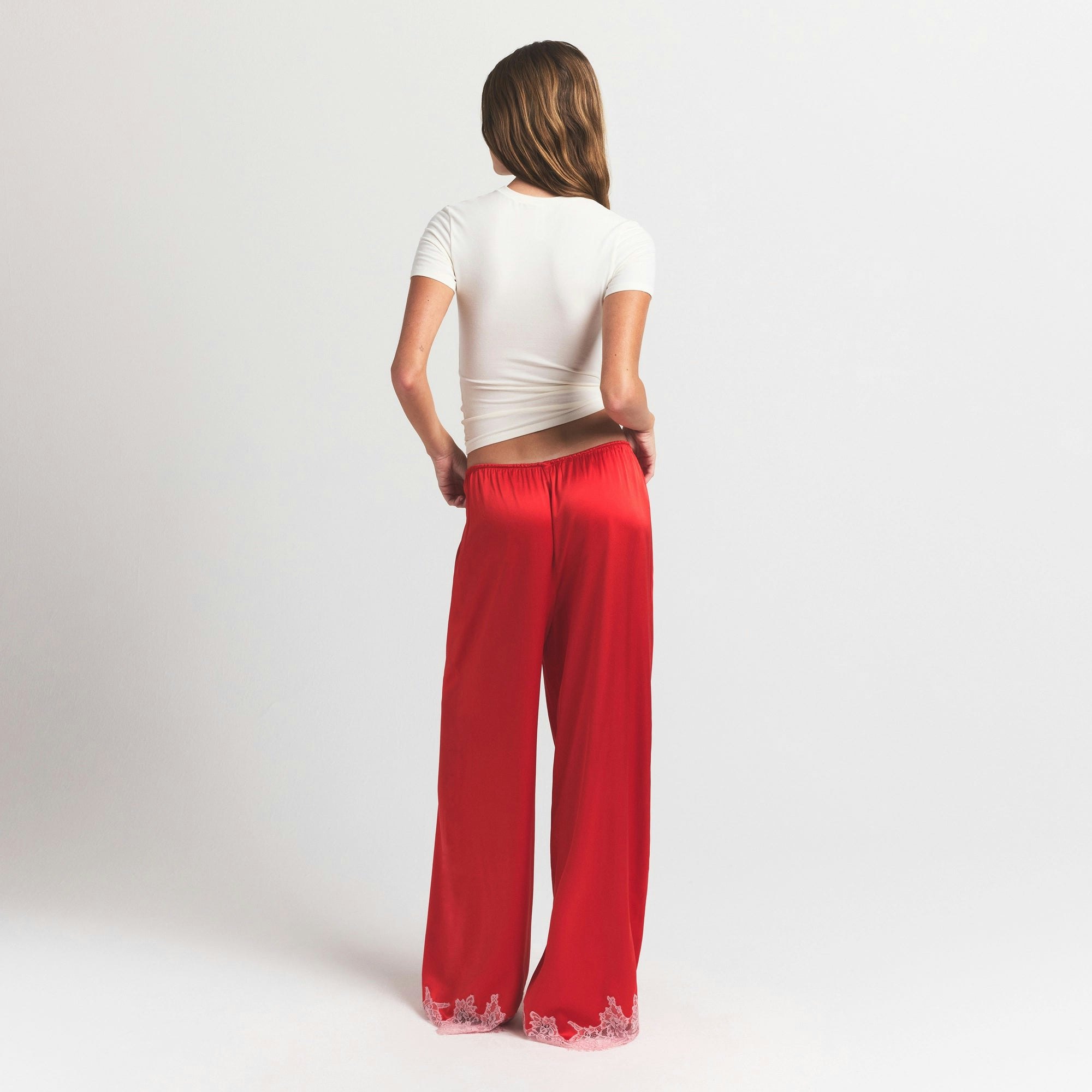 SILK LACE PANT | RUBY CONTRAST ON A MODEL FRONT VIEW @ | FOCUS: 0.0, 1.0, 0.9