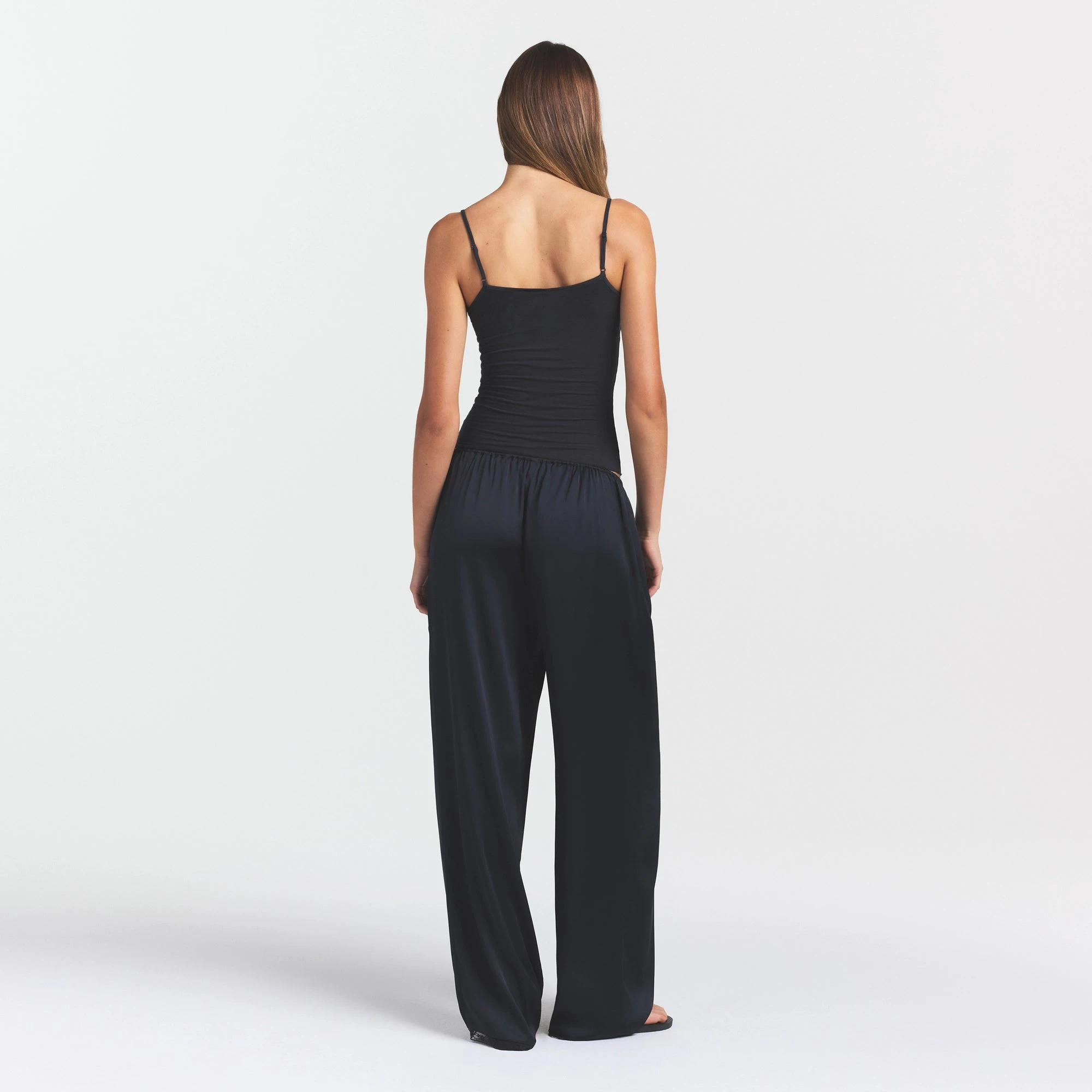 WOVEN SHINE LACE PANT | ONYX ON A MODEL FRONT VIEW @ | FOCUS: 0.0, 1.0, 0.9