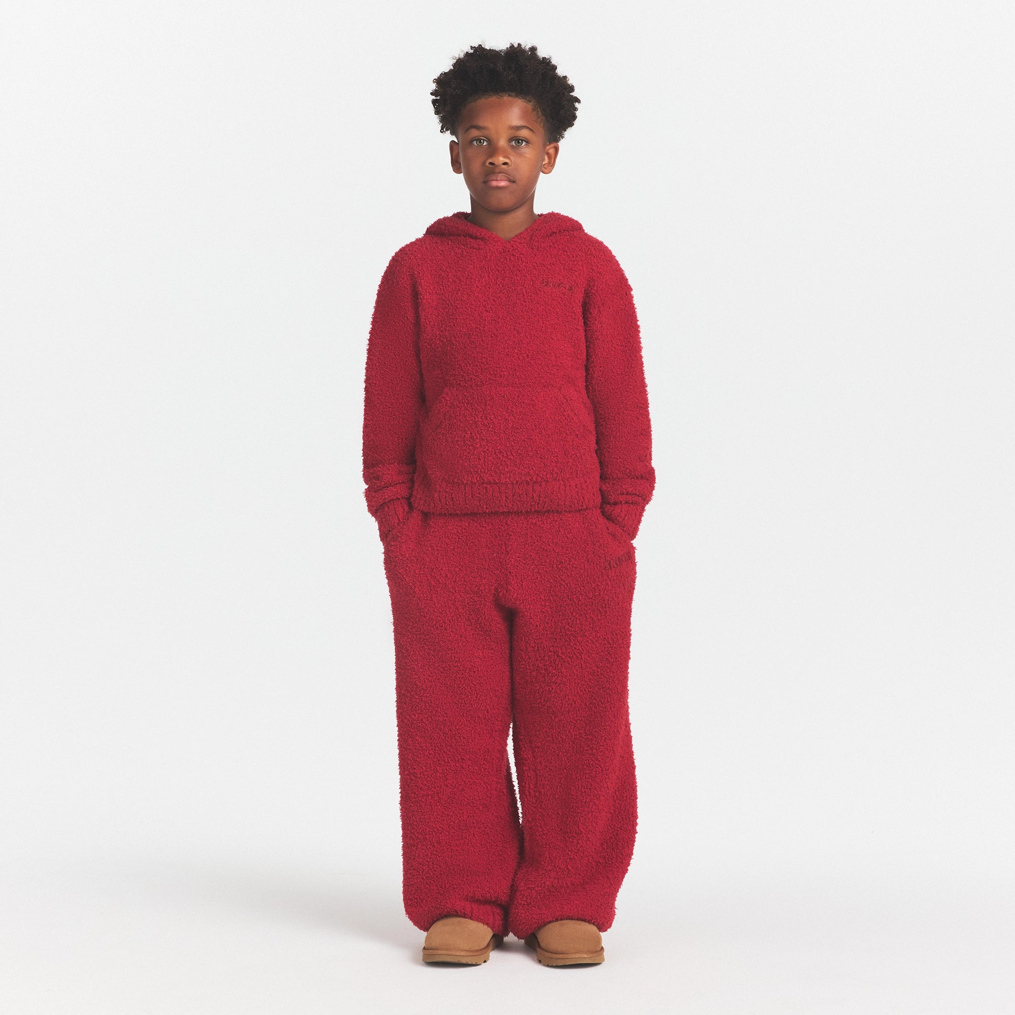 KIDS COZY STRAIGHT LEG PANT | BRICK ON A MODEL FRONT VIEW @ | FOCUS: 0.0, 1.0, 0.9