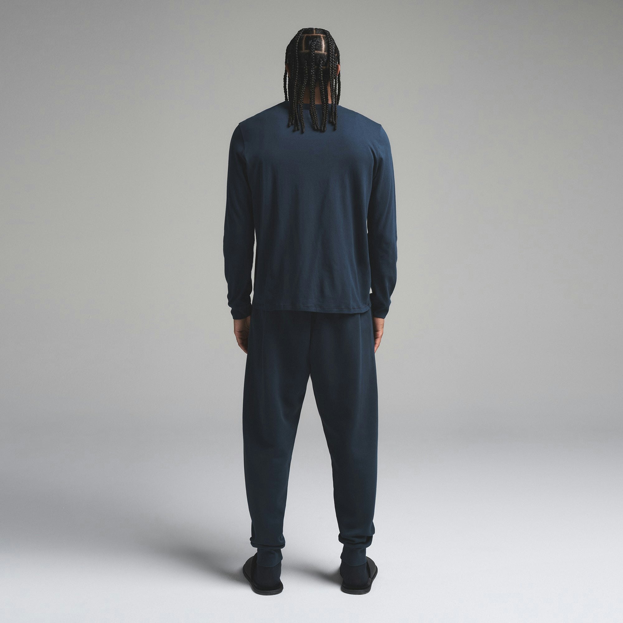 FLEECE LOUNGE MENS TAPERED JOGGER | NAVY ON A MODEL SIDE VIEW | FOCUS: 0.0, 1.0, 0.9