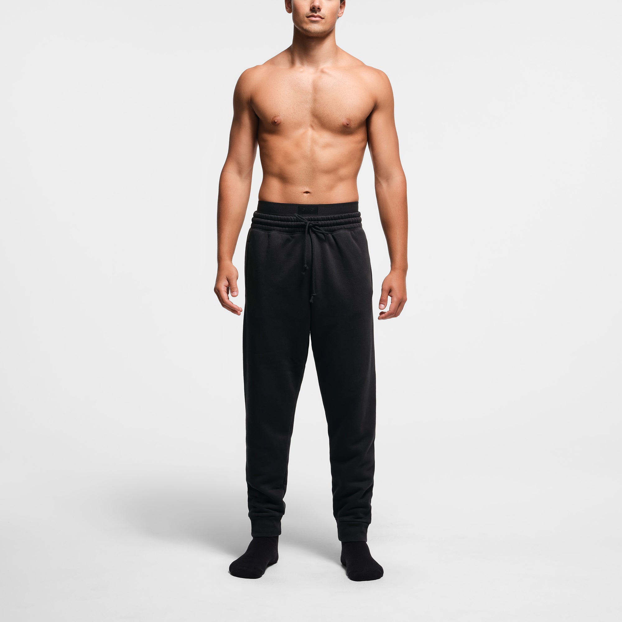 Mens black tapered joggers best sale