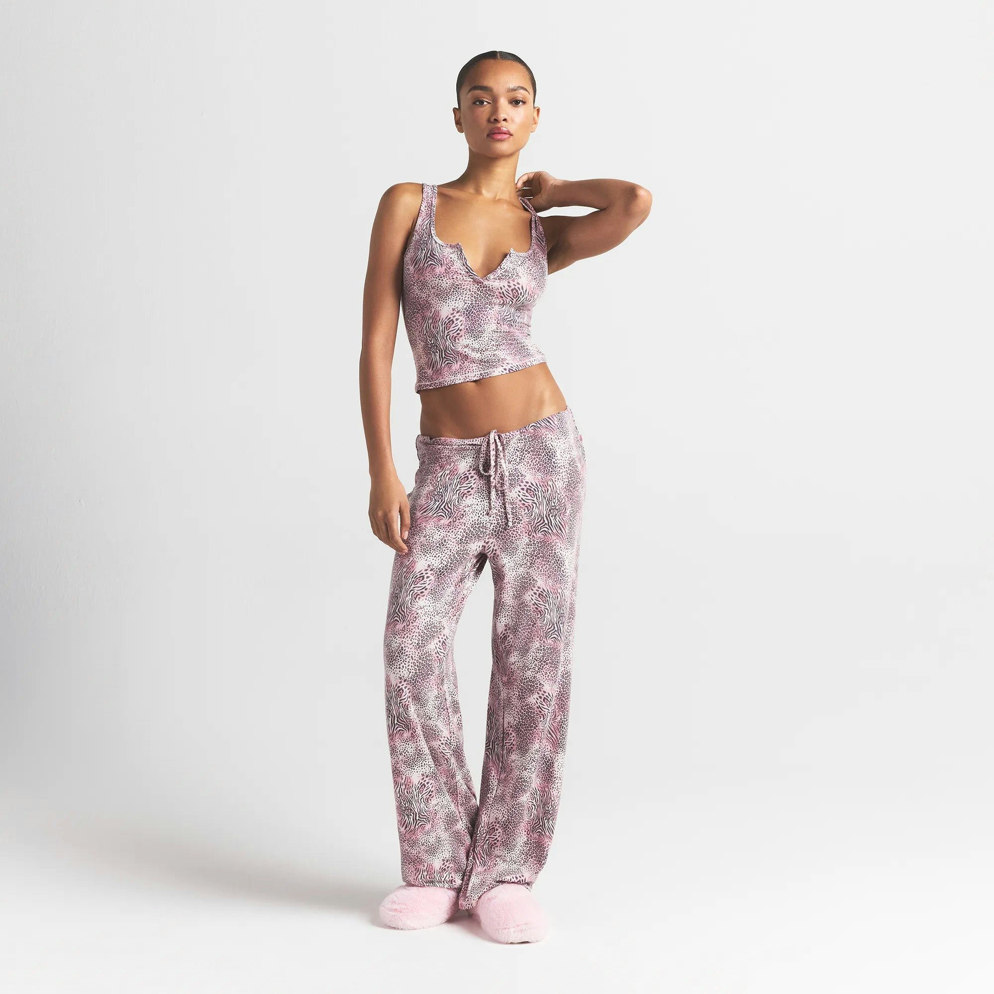 SKIMS SLEEP STRAIGHT LEG PANT | BLOOM MINI MULTI ANIMAL ON A MODEL FRONT VIEW @ | FOCUS: 0.0, 1.0, 0.9