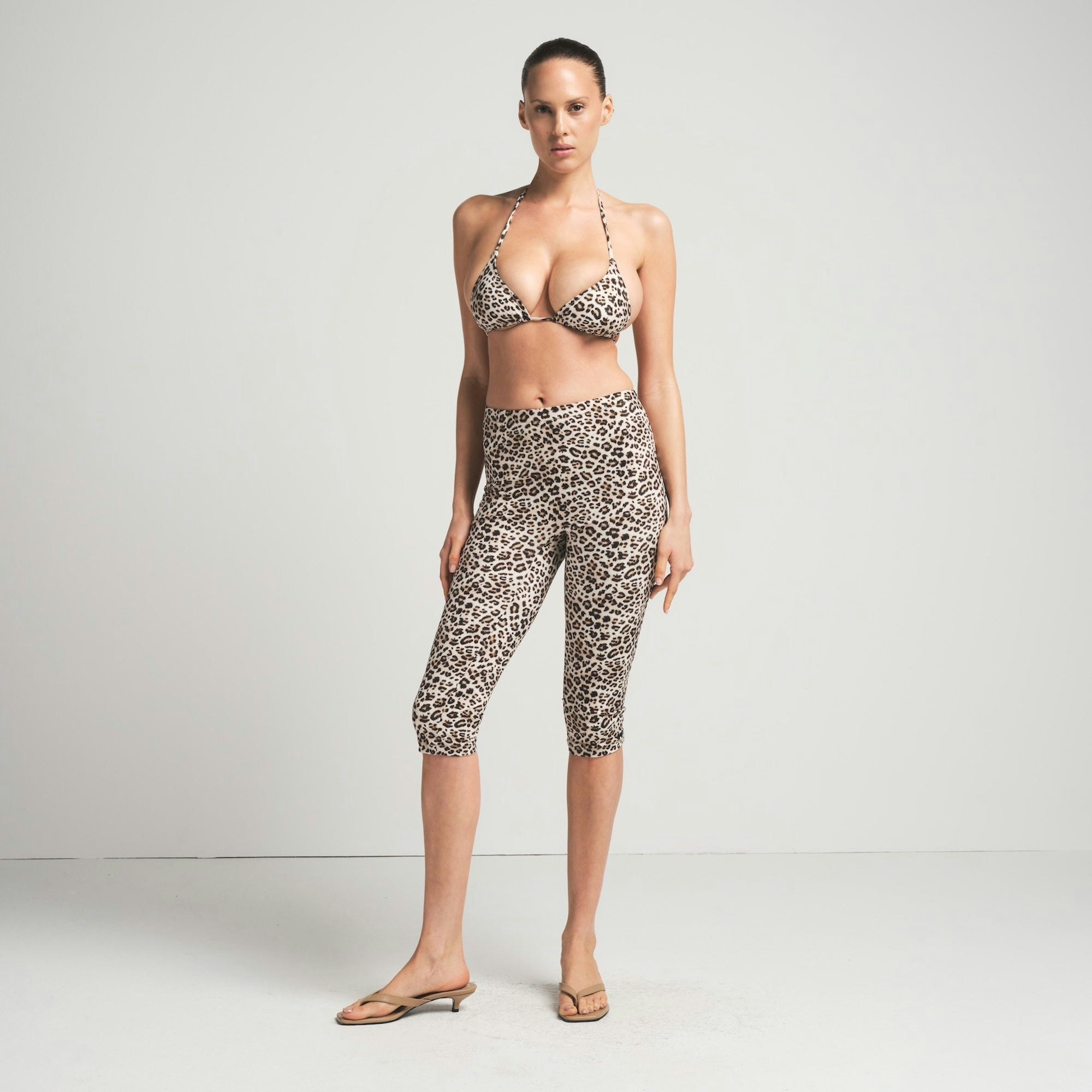 SIGNATURE SWIM CAPRI | CHAMPAGNE LEOPARD PRINT ON A MODEL FRONT VIEW | FOCUS: 0.0, 1.0, 0.9 | FOCUS: 0.0, 1.0, 0.9