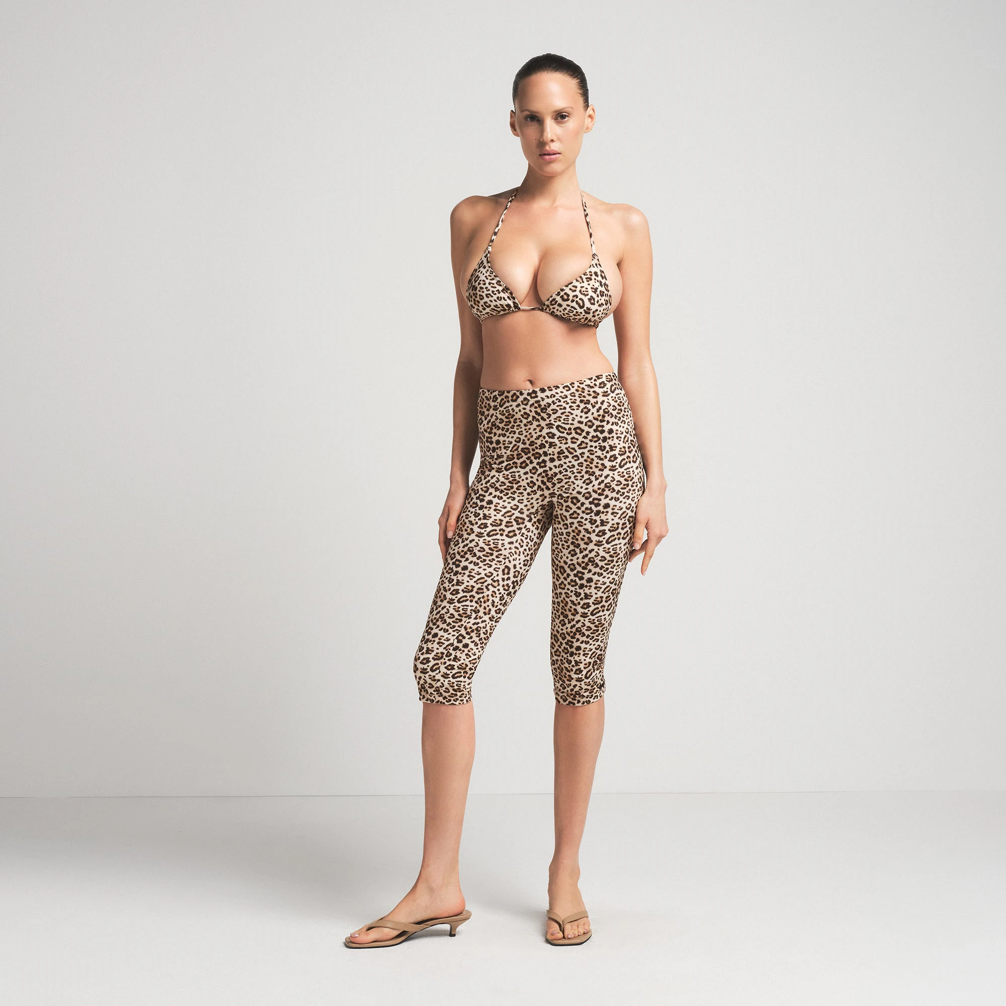 SIGNATURE SWIM CAPRI | CHAMPAGNE LEOPARD PRINT ON A MODEL FRONT VIEW | FOCUS: 0.0, 1.0, 0.9