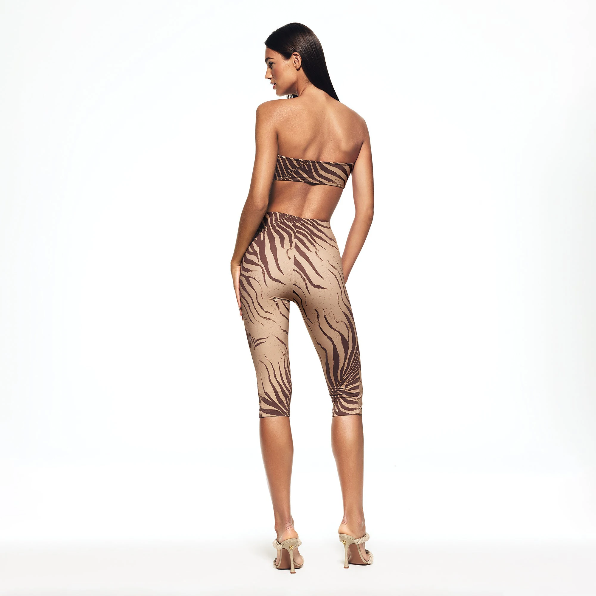 ROBERTO CAVALLI X SKIMS CAPRI | ZEBRA PRINT ON A MODEL BACK VIEW | FOCUS: 0.0, 1.0, 0.9