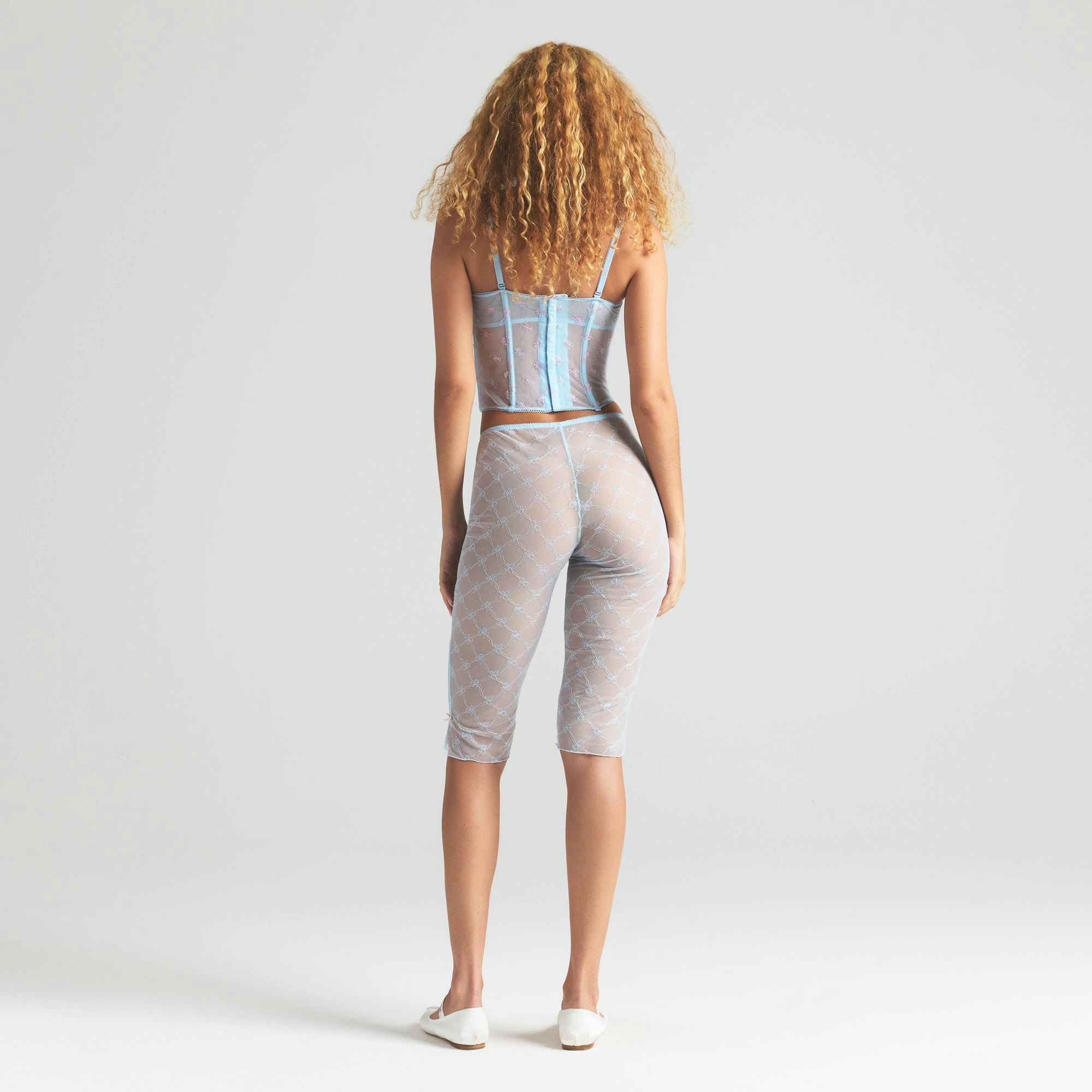 SPRING INTIMATES CAPRI | POWDER BLUE BOW TULLE ON A MODEL FRONT VIEW | FOCUS: 0.0, 1.0, 0.9