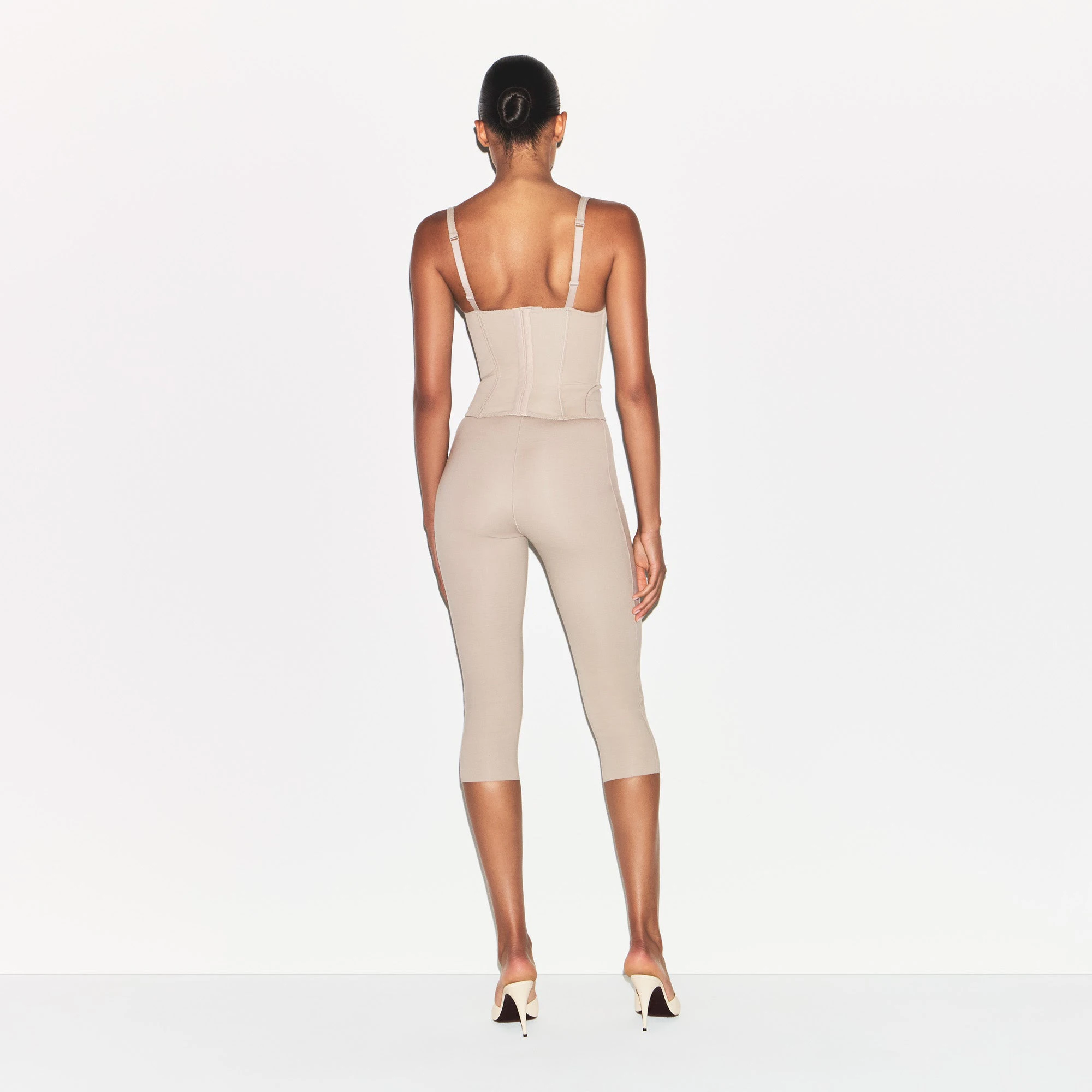 COTTON SHAPEWEAR CAPRI | LINEN ON A MODEL BACK VIEW | FOCUS: 0.0, 1.0, 0.9