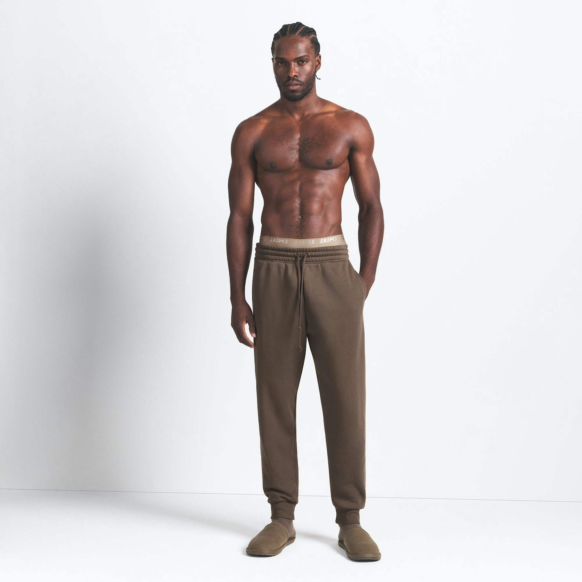 FLEECE LOUNGE MENS TAPERED JOGGER | DRIFTWOOD ON A MODEL FRONT VIEW @ | FOCUS: 0.9, 0.1, 0.7