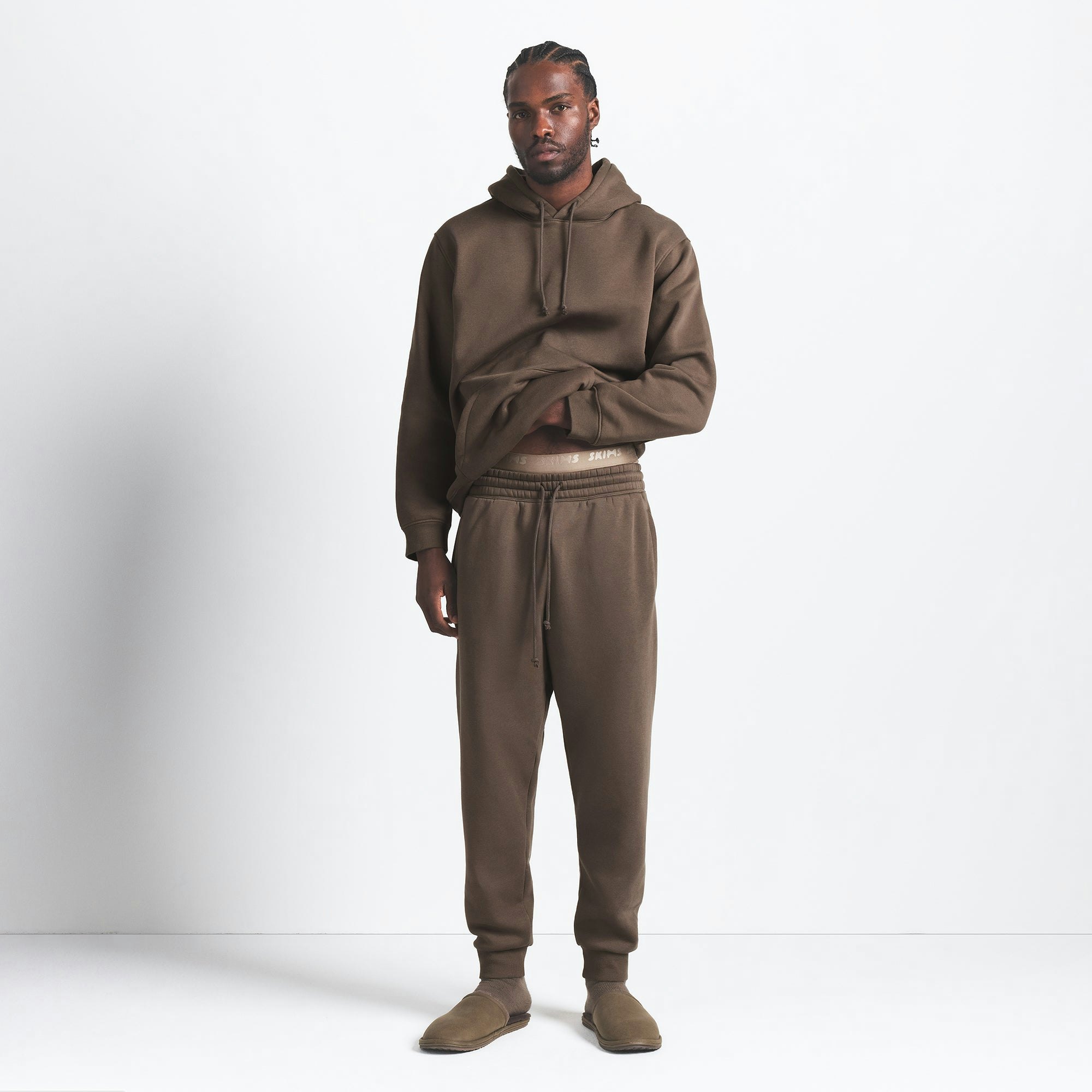 FLEECE LOUNGE MENS TAPERED JOGGER | DRIFTWOOD ON A MODEL FRONT VIEW @ | FOCUS: 0.9, 0.1, 0.7