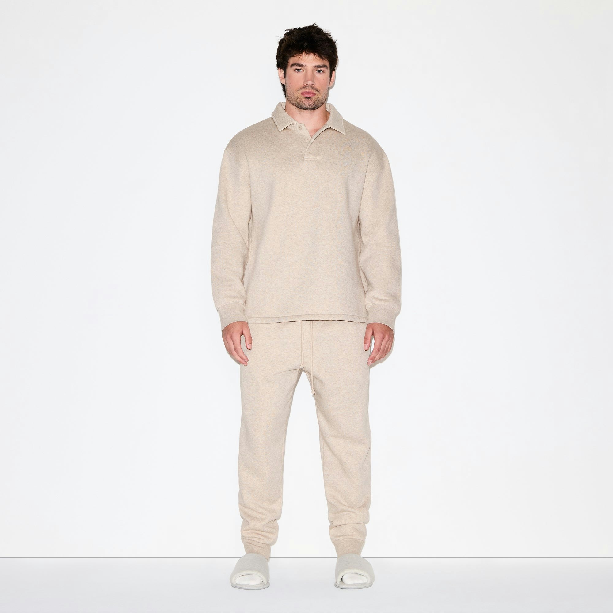 FLEECE LOUNGE MENS TAPERED JOGGER | DESERT HEATHER ON A MODEL FRONT VIEW @ | FOCUS: 0.0, 1.0, 0.9