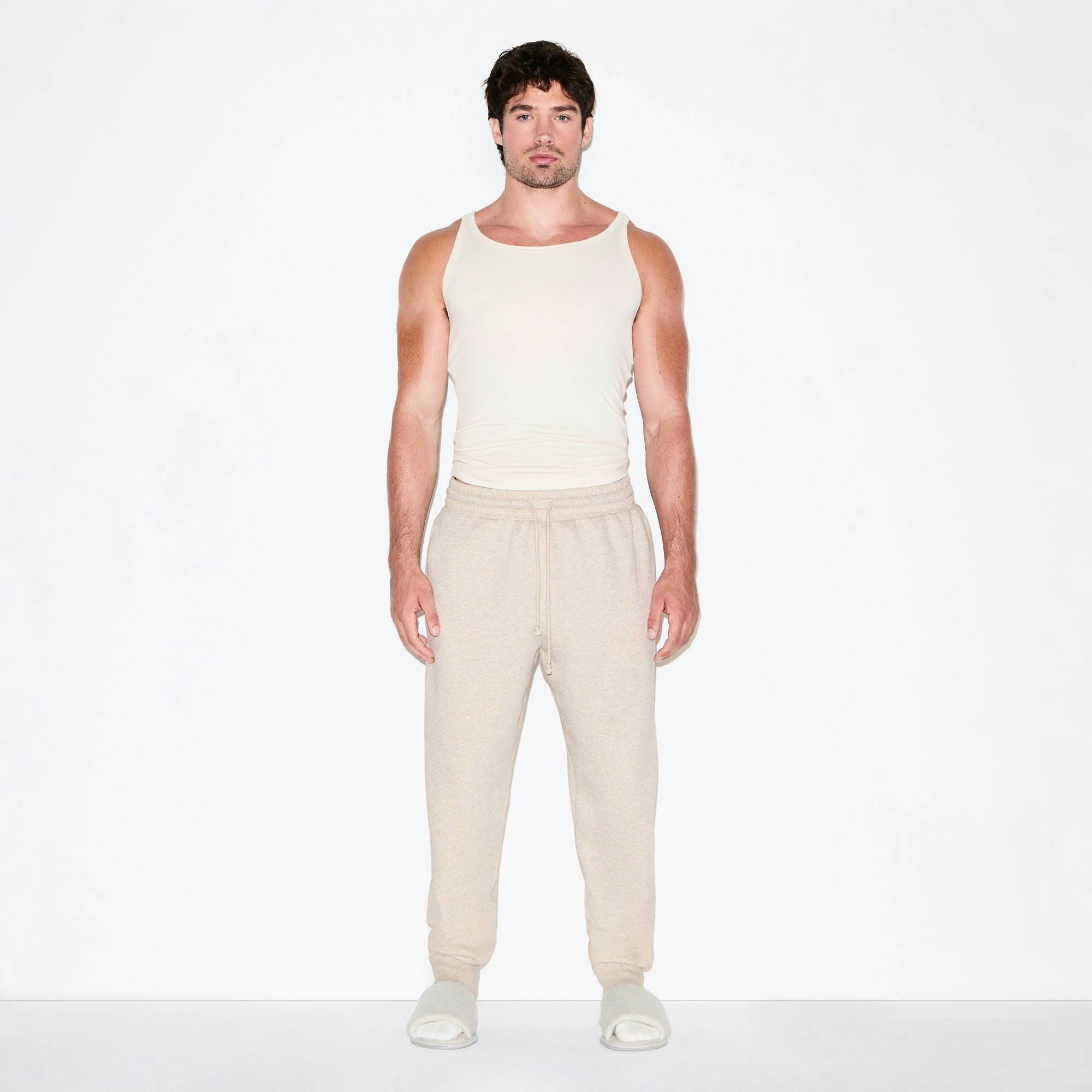 FLEECE LOUNGE MENS TAPERED JOGGER | DESERT HEATHER ON A MODEL FRONT VIEW @ | FOCUS: 0.0, 1.0, 0.9