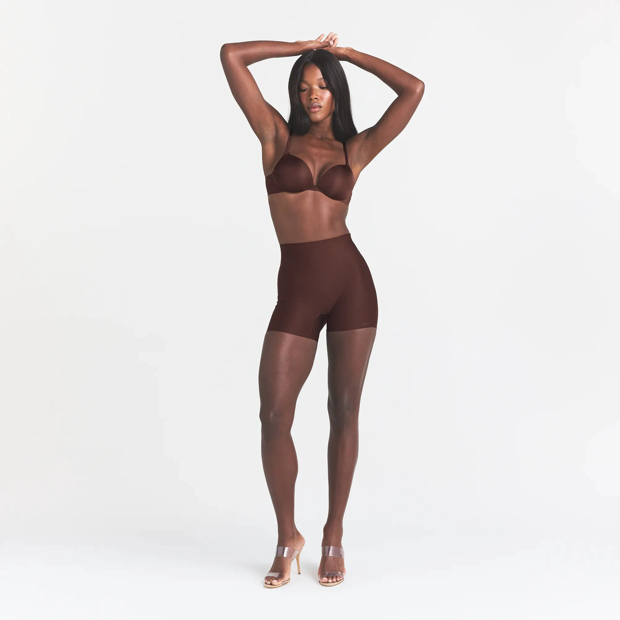 SKIMS BODY CORE SCULPT SHORTIE | COCOA ON A MODEL FRONT VIEW @ | FOCUS: 0.0, 1.0, 0.9