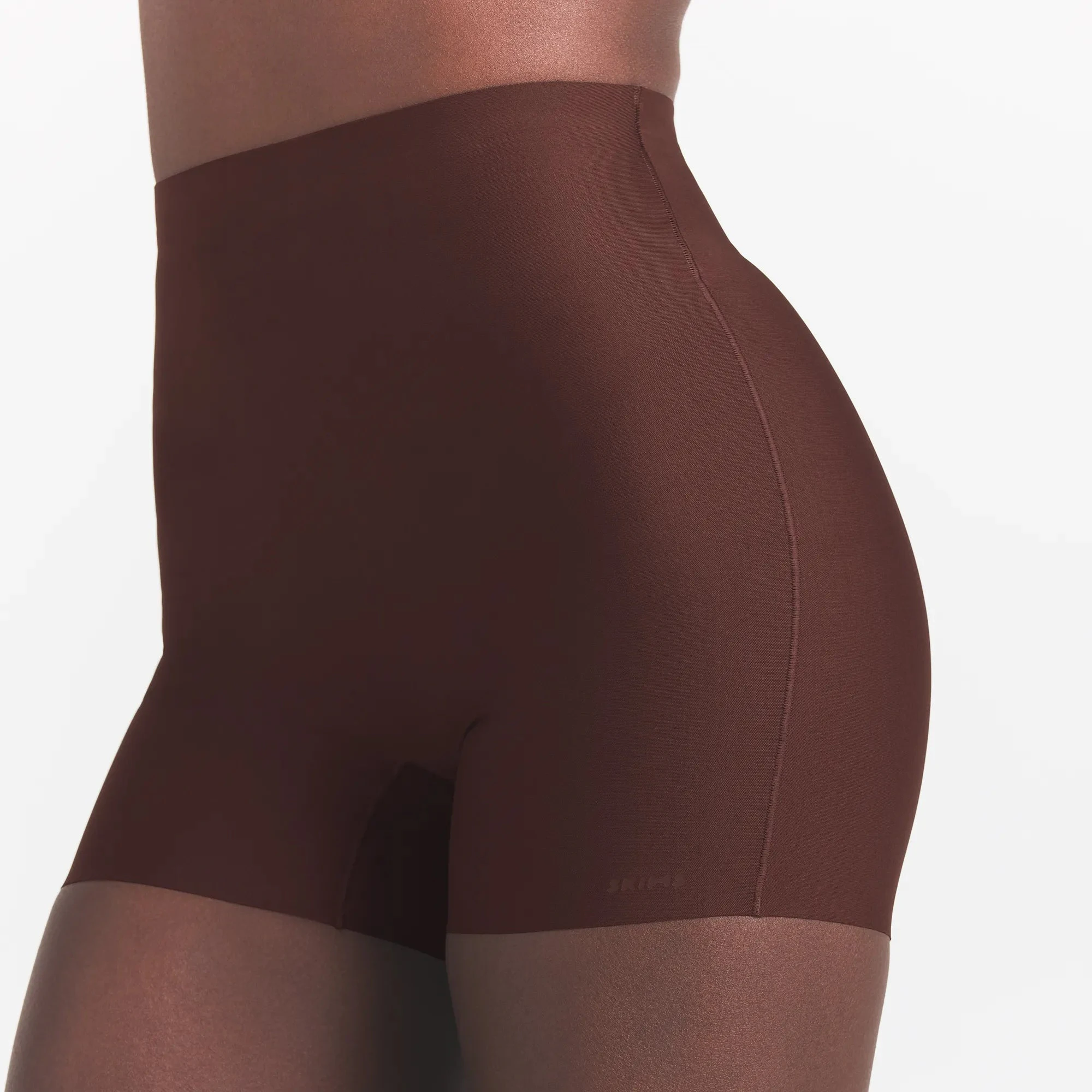SKIMS BODY CORE SCULPT SHORTIE | COCOA ON A MODEL FRONT VIEW @ | FOCUS: 0.0, 1.0, 0.9
