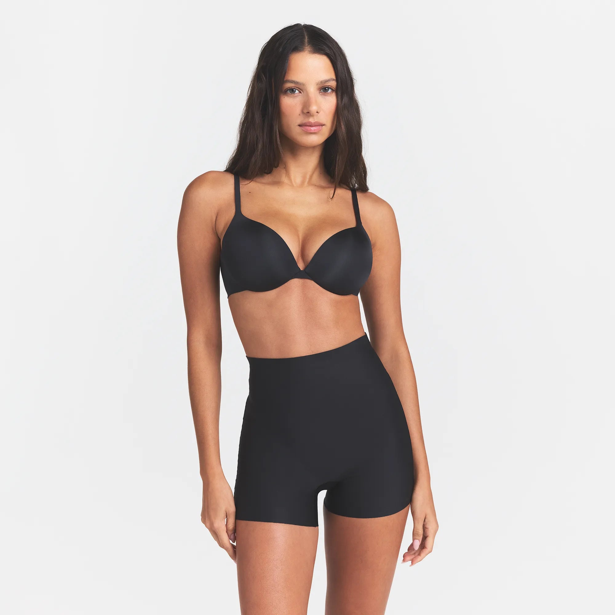SKIMS BODY CORE SCULPT SHORTIE | ONYX ON A MODEL FRONT VIEW @