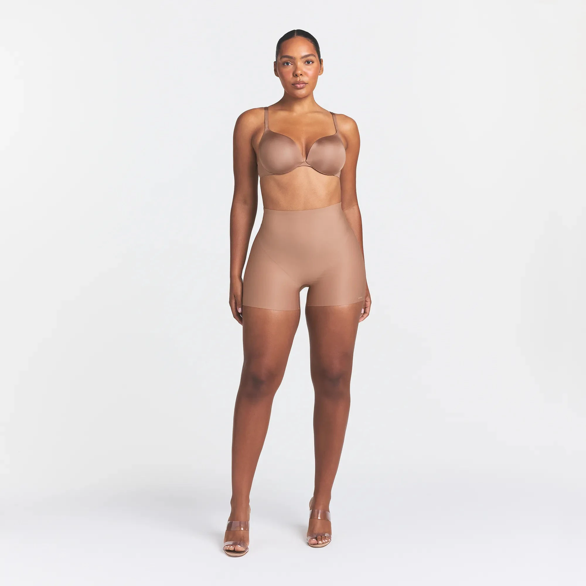 SKIMS BODY CORE SCULPT SHORTIE | SIENNA ON A MODEL FRONT VIEW @ | FOCUS: 0.0, 1.0, 0.9