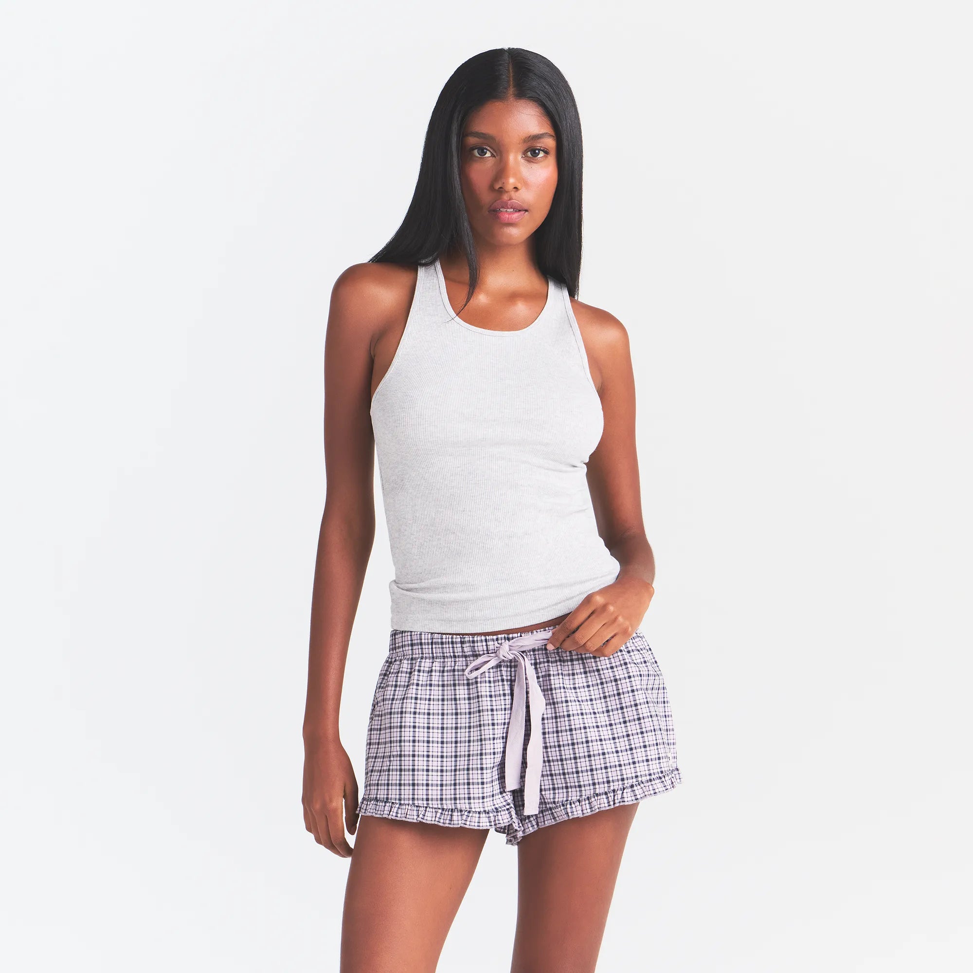 COTTON POPLIN SLEEP RUFFLE SHORT | IRIS MICA NAVY CHECK & LAYS FLAT ON A WHITE BACKGROUND | FLT @ | FOCUS: 0.0, 1.0, 0.9