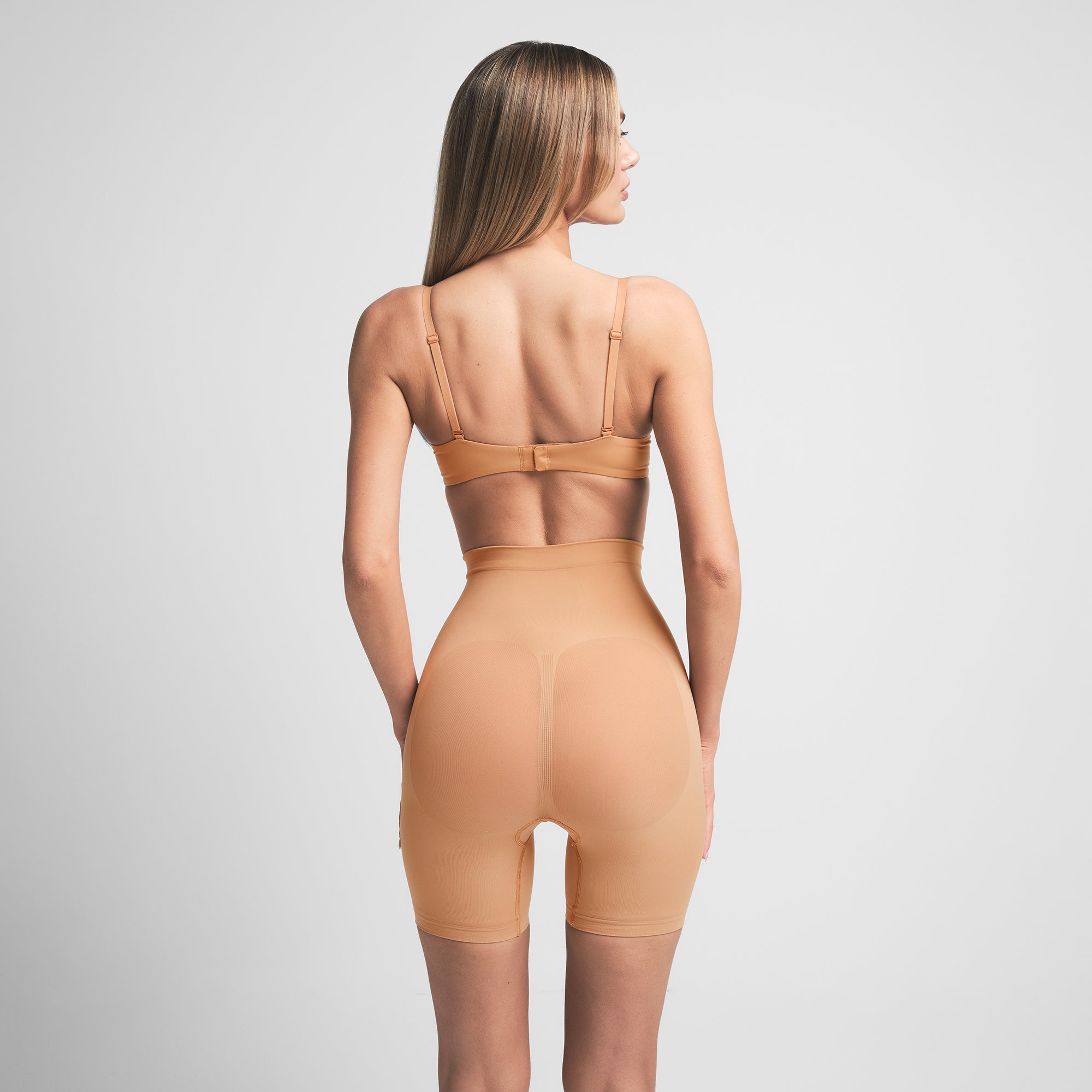SEAMLESS SCULPT MID THIGH SHORT | OCHRE