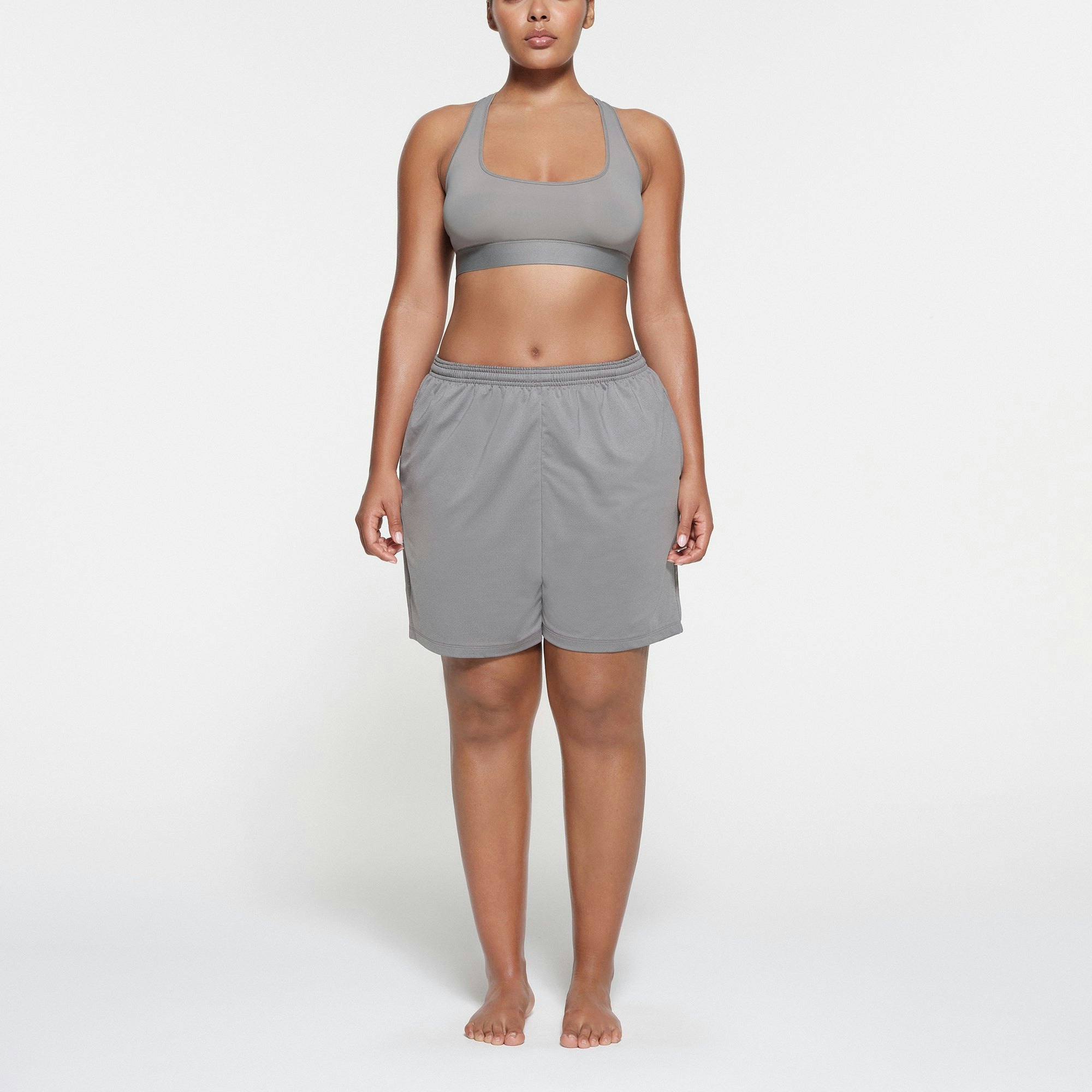 SKIMS TRACK MESH SHORT | PACIFIC ON A MODEL FRONT VIEW