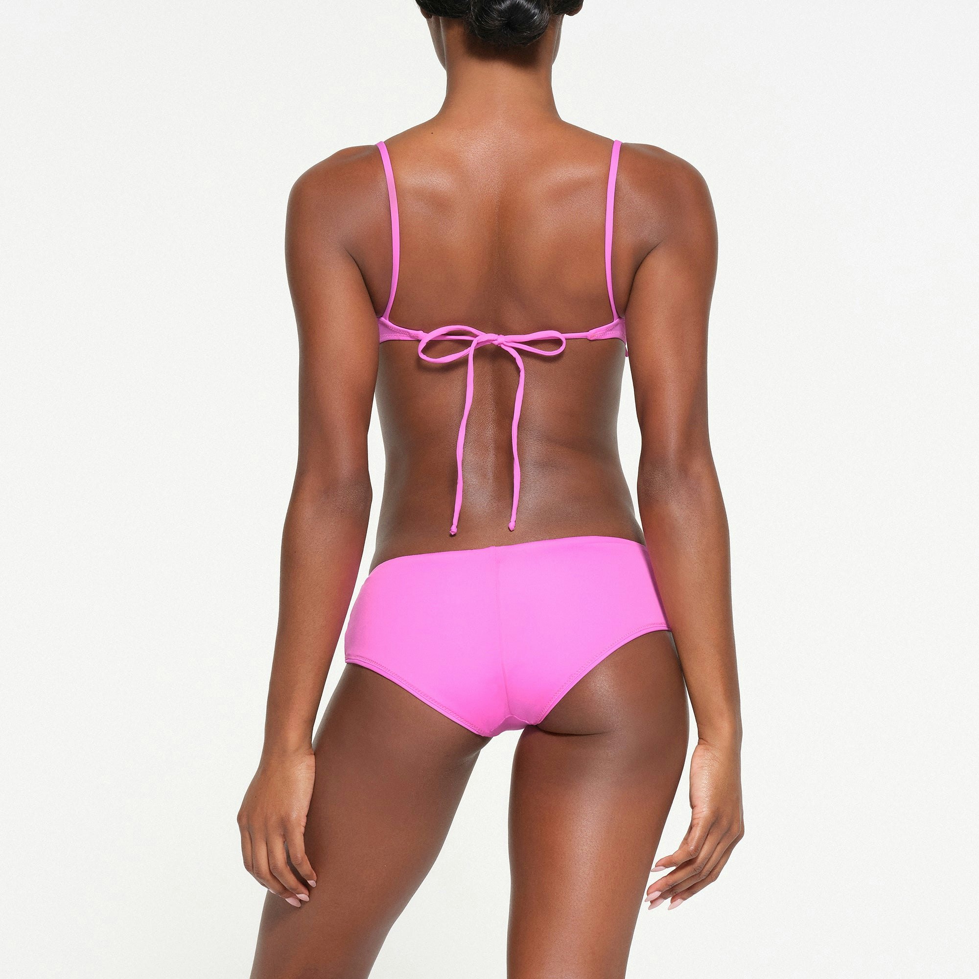 SIGNATURE SWIM HIPSTER | NEON ORCHID ON A MODEL BACK VIEW