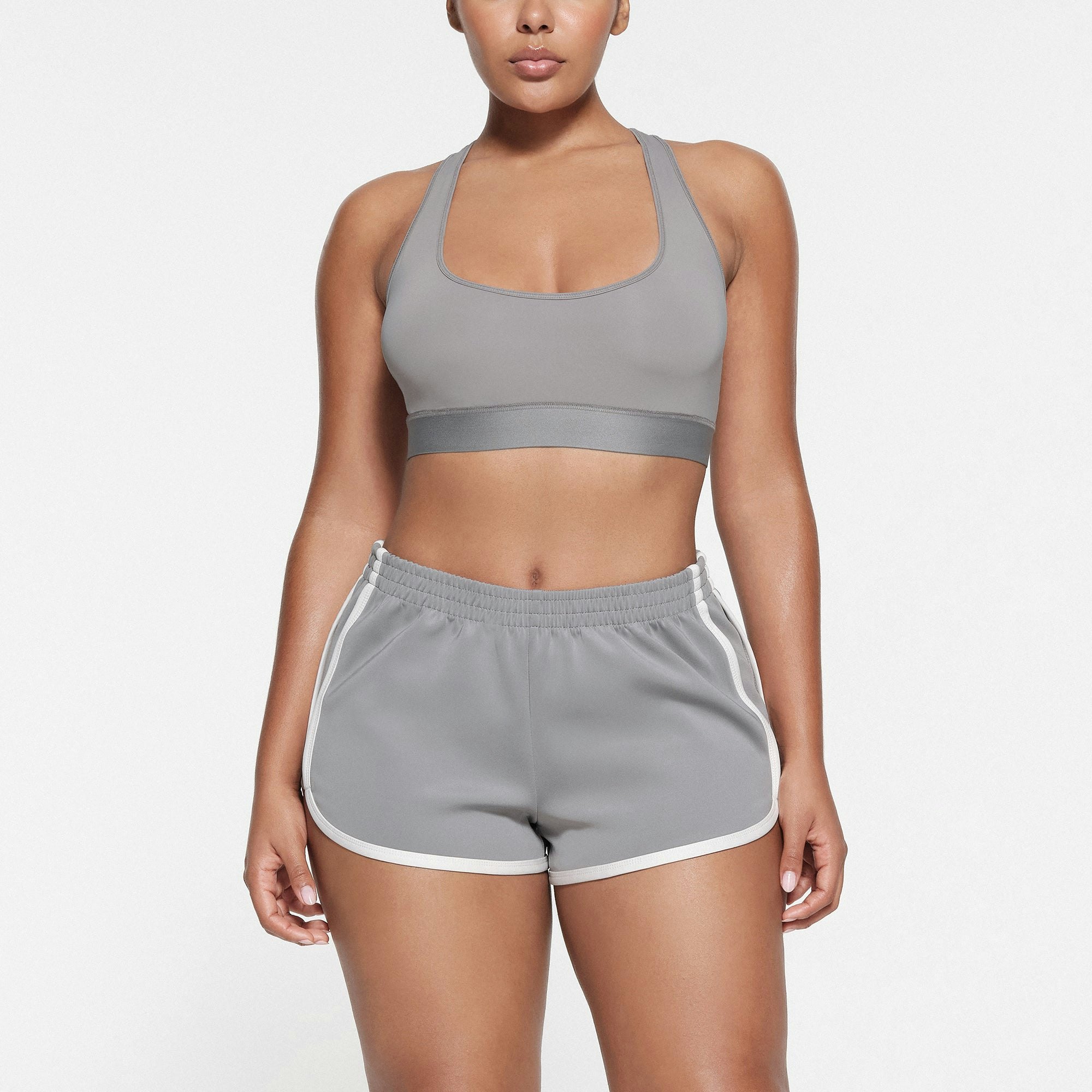 SKIMS TRACK SHORT | PACIFIC ON A MODEL FRONT VIEW