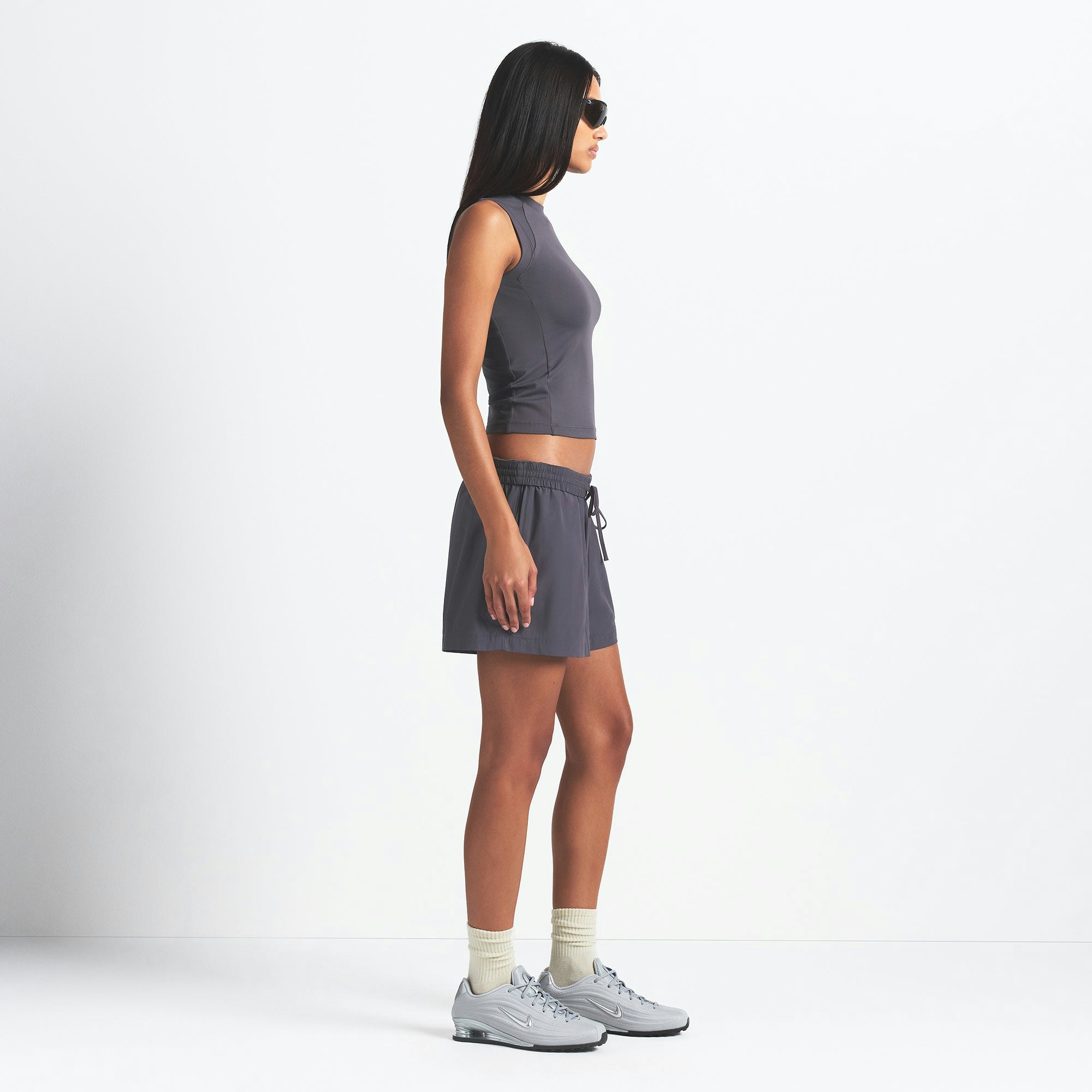 NikeSKIMS WOVEN NYLON 5" TRACK SHORT | RAVEN ON A MODEL SIDE VIEW @ | FOCUS: 0.0, 1.0, 0.9
