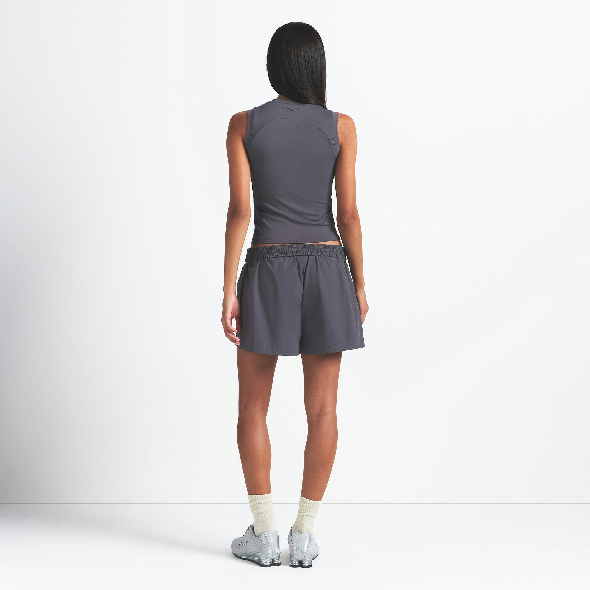 NikeSKIMS WOVEN NYLON 5" TRACK SHORT | RAVEN ON A MODEL BACK VIEW @ | FOCUS: 0.0, 1.0, 0.9
