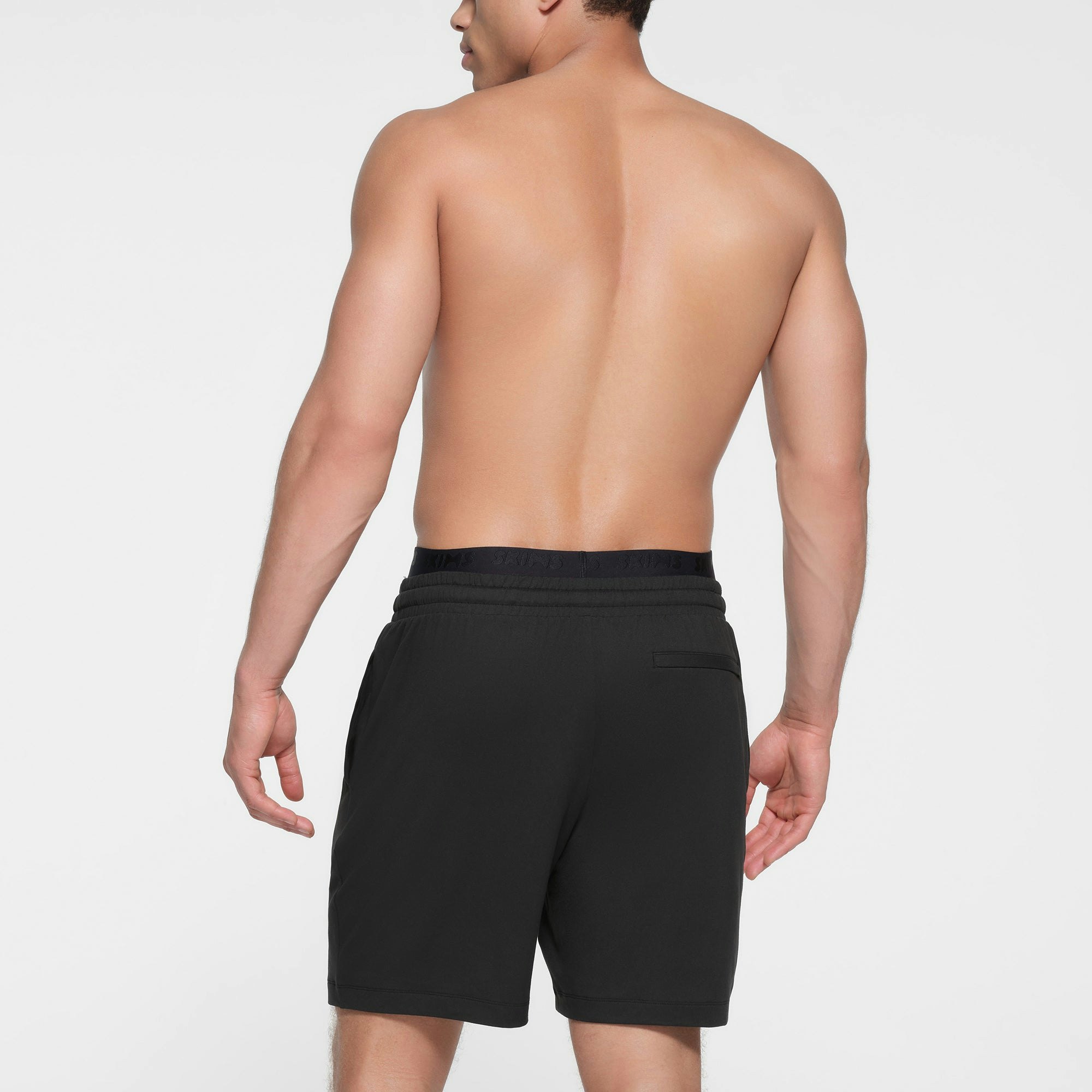 OUTDOOR JERSEY MENS CLASSIC SHORT | ONYX ON A MODEL BACK VIEW