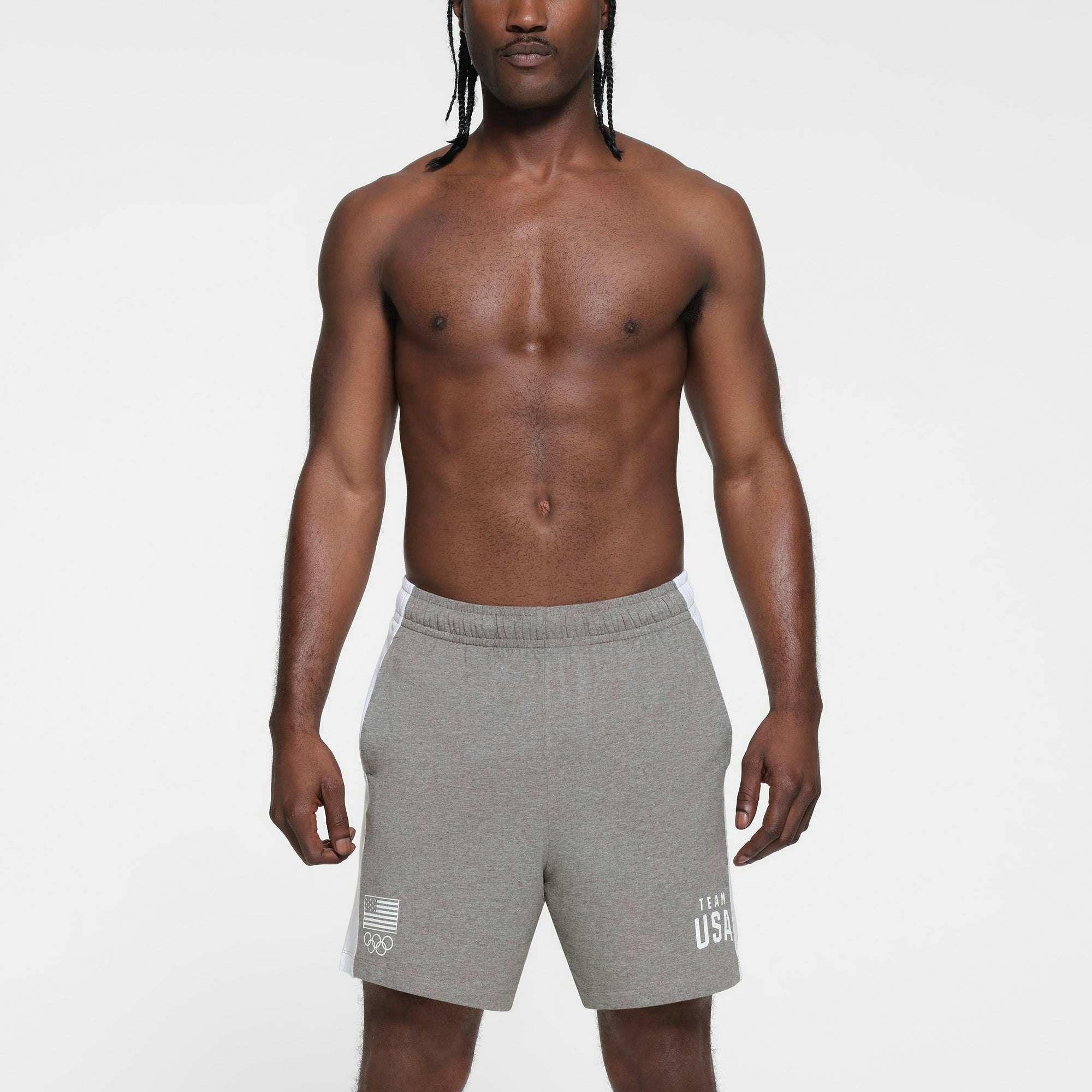 SKIMS FOR TEAM USA JERSEY SLEEP MENS OLYMPIC SHORT | HEATHER GREY ON A MODEL FRONT VIEW