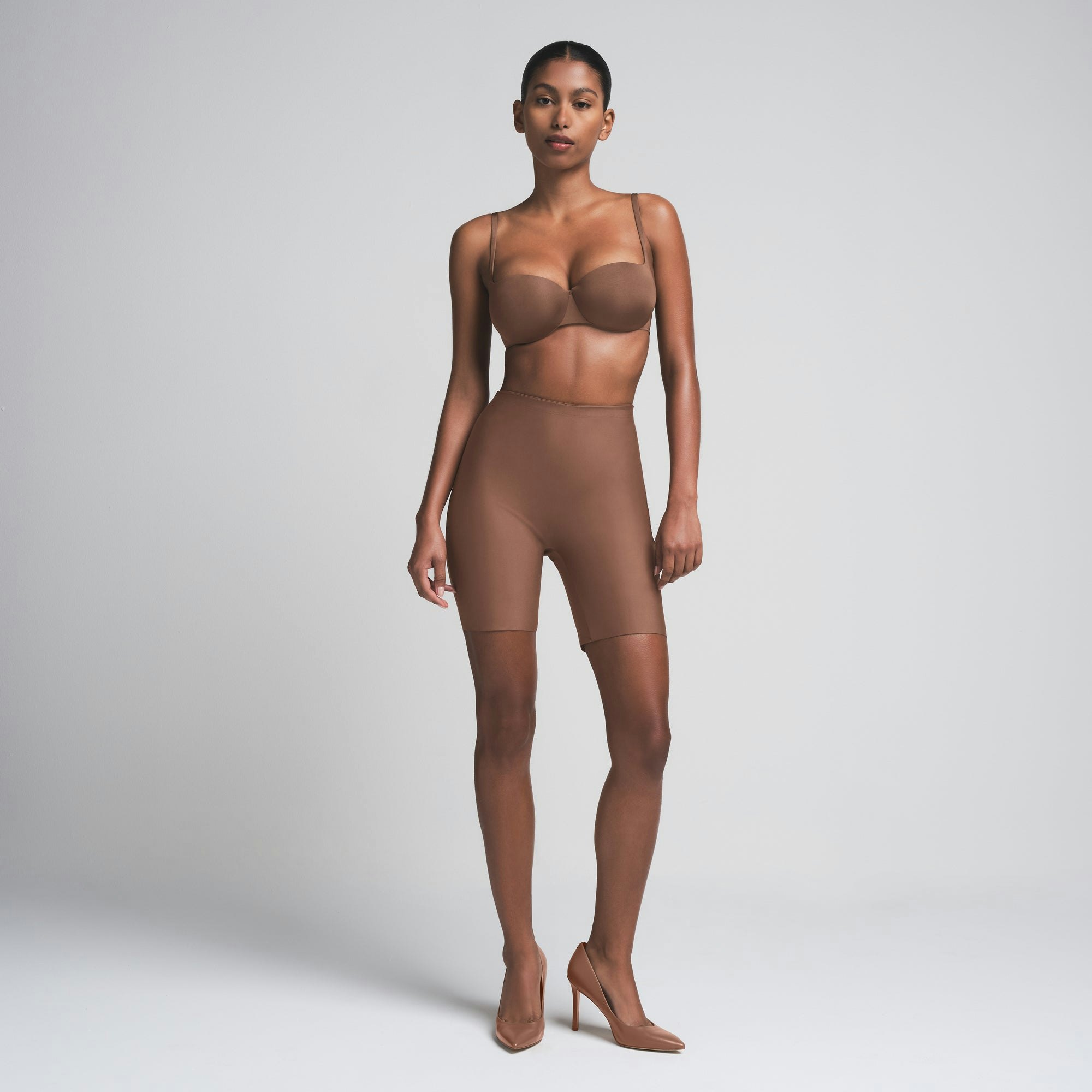 SKIMS BODY BUTT ENHANCING PADDED SHORT | JASPER ON A MODEL FRONT VIEW