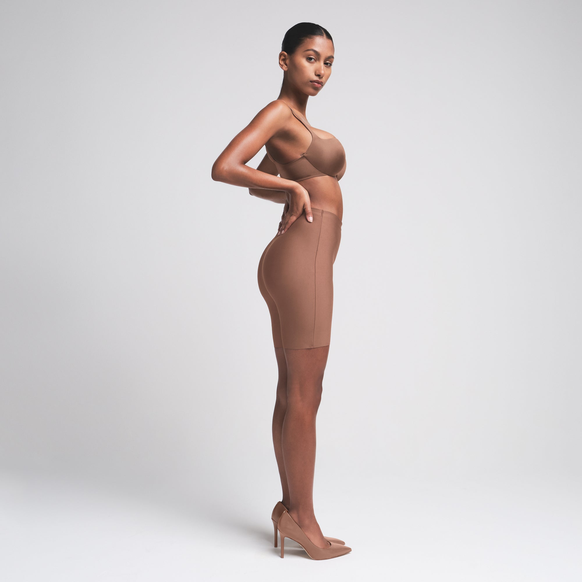 SKIMS BODY BUTT ENHANCING PADDED SHORT | JASPER ON A MODEL FRONT VIEW | FOCUS: 0.0, 1.0, 0.9