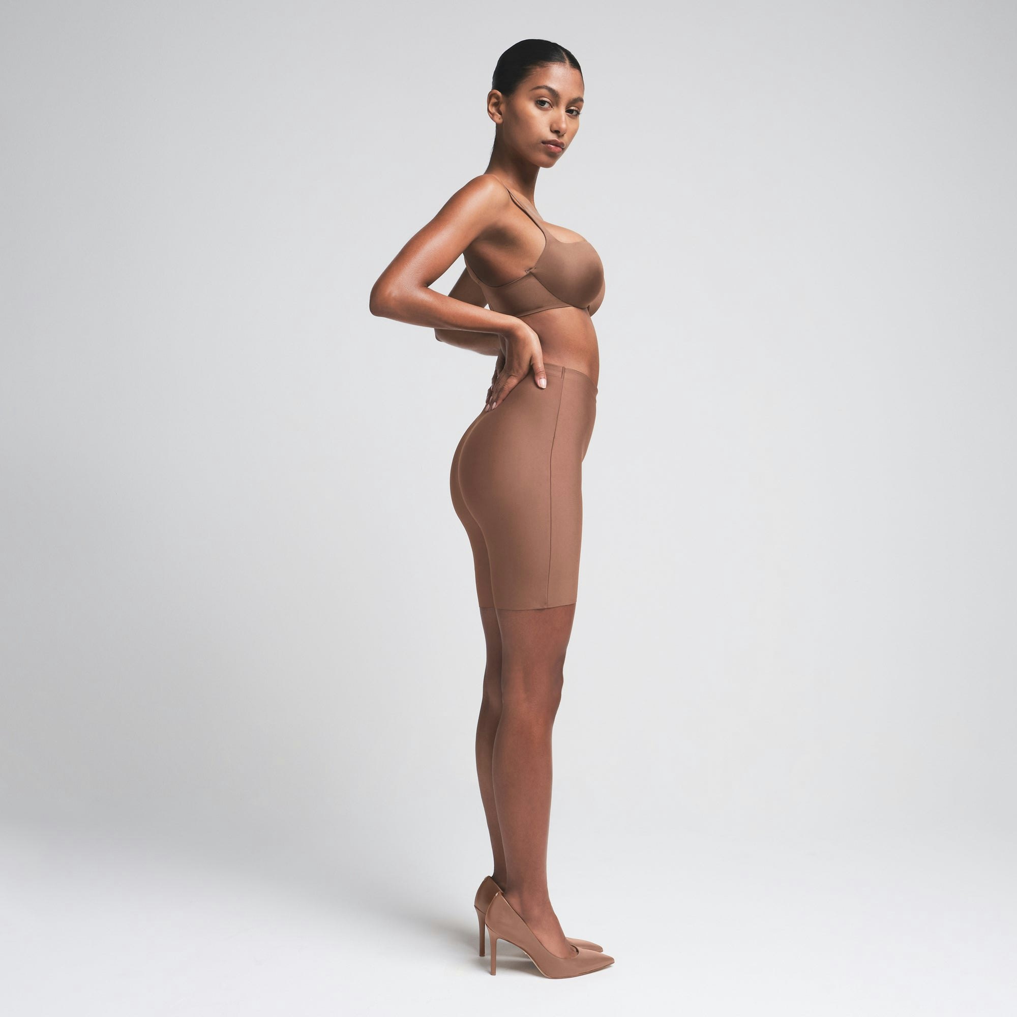 SKIMS BODY BUTT ENHANCING PADDED SHORT | JASPER ON A MODEL FRONT VIEW | FOCUS: 0.0, 1.0, 0.9