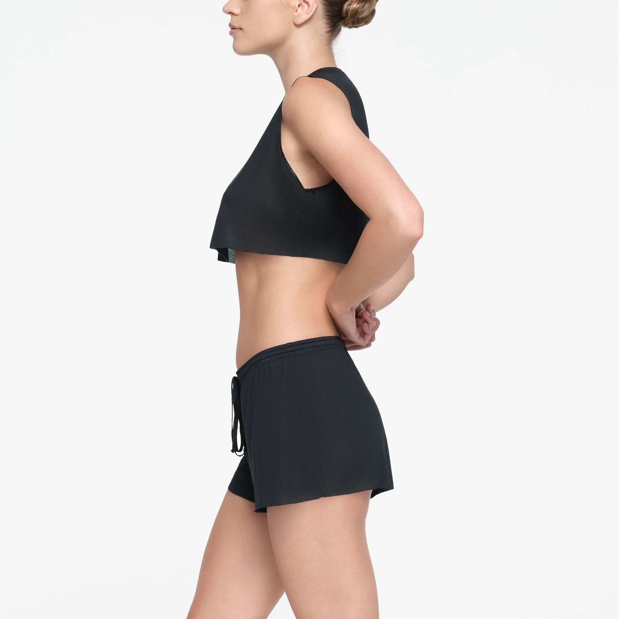 KIM'S SLEEP SHORT SHORT | ONYX ON A MODEL SIDE VIEW