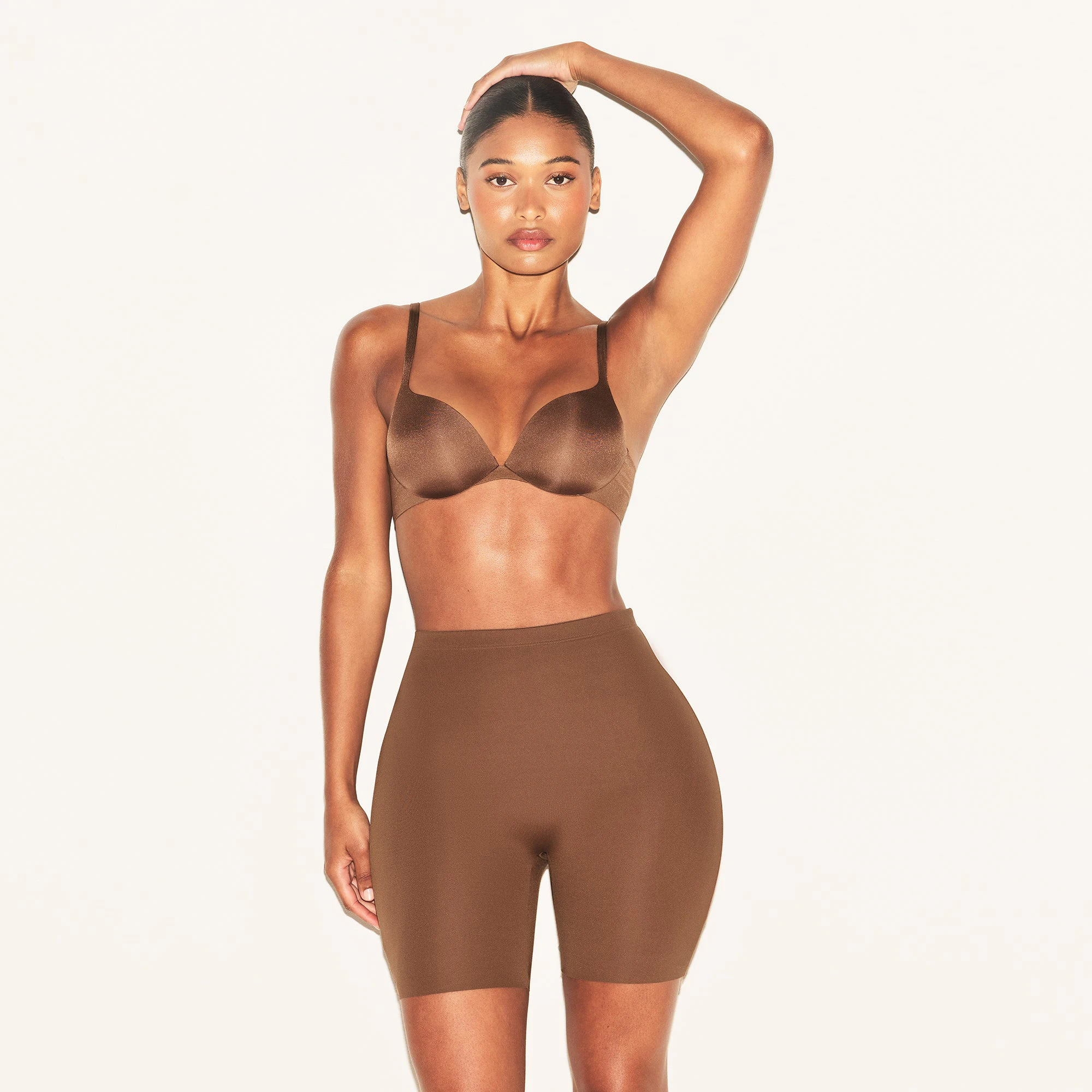 SKIMS BODY HIP ENHANCING PADDED SHORT | JASPER ON A MODEL FRONT VIEW | FOCUS: 0.0, 1.0, 0.9