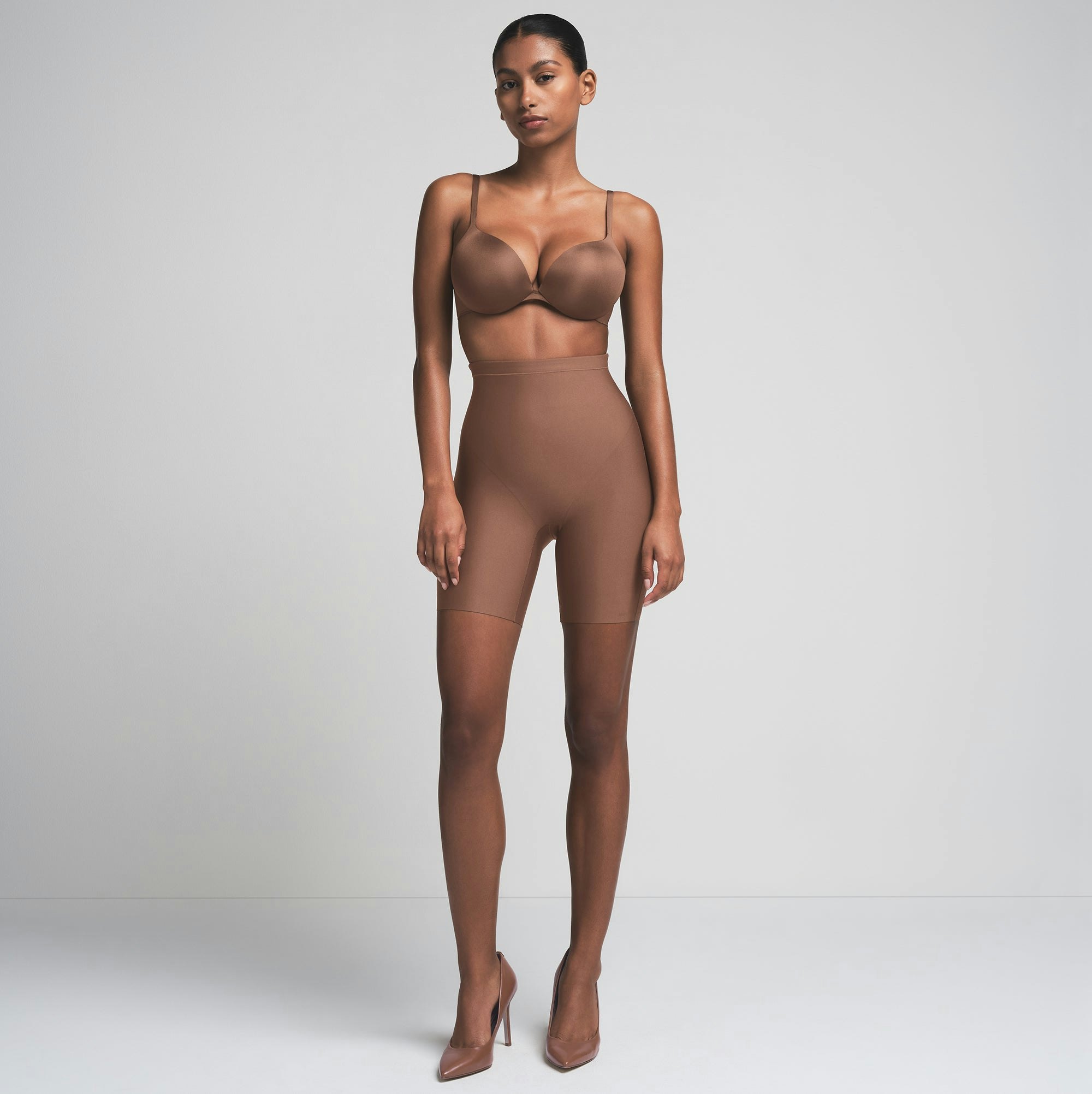 SKIMS BODY CORE SCULPT MID RISE SHORT | JASPER  ON A MODEL FRONT VIEW | FOCUS: 0.0, 1.0, 0.9