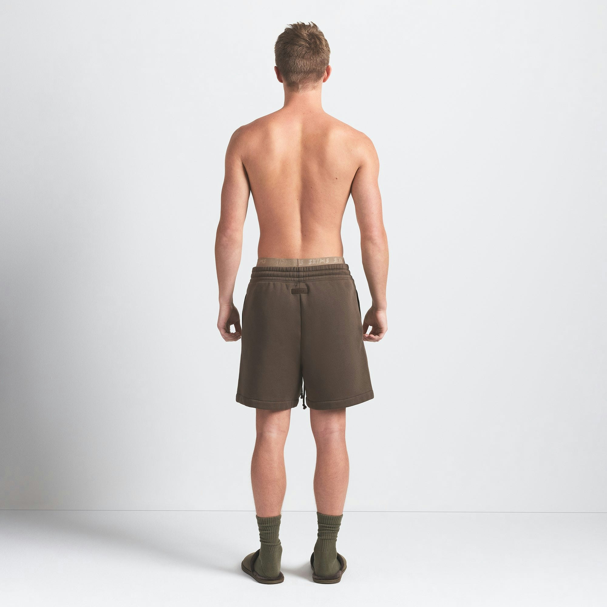 FLEECE LOUNGE MENS RELAXED SHORT | DRIFTWOOD ON A MODEL BACK VIEW @ | FOCUS: 0.0, 1.0, 0.9