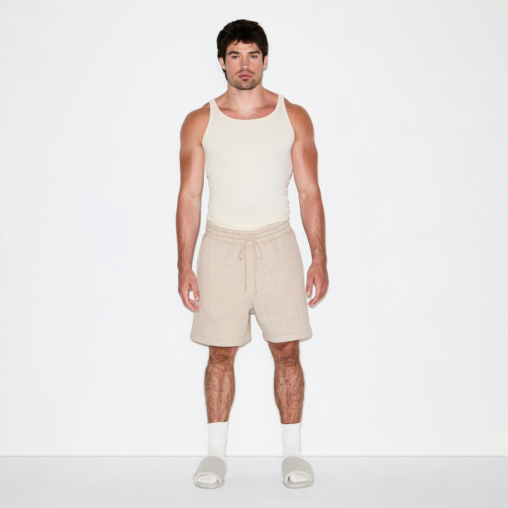 FLEECE LOUNGE MENS RELAXED SHORT | DESERT HEATHER ON A MODEL FRONT VIEW @ | FOCUS: 0.0, 1.0, 0.9