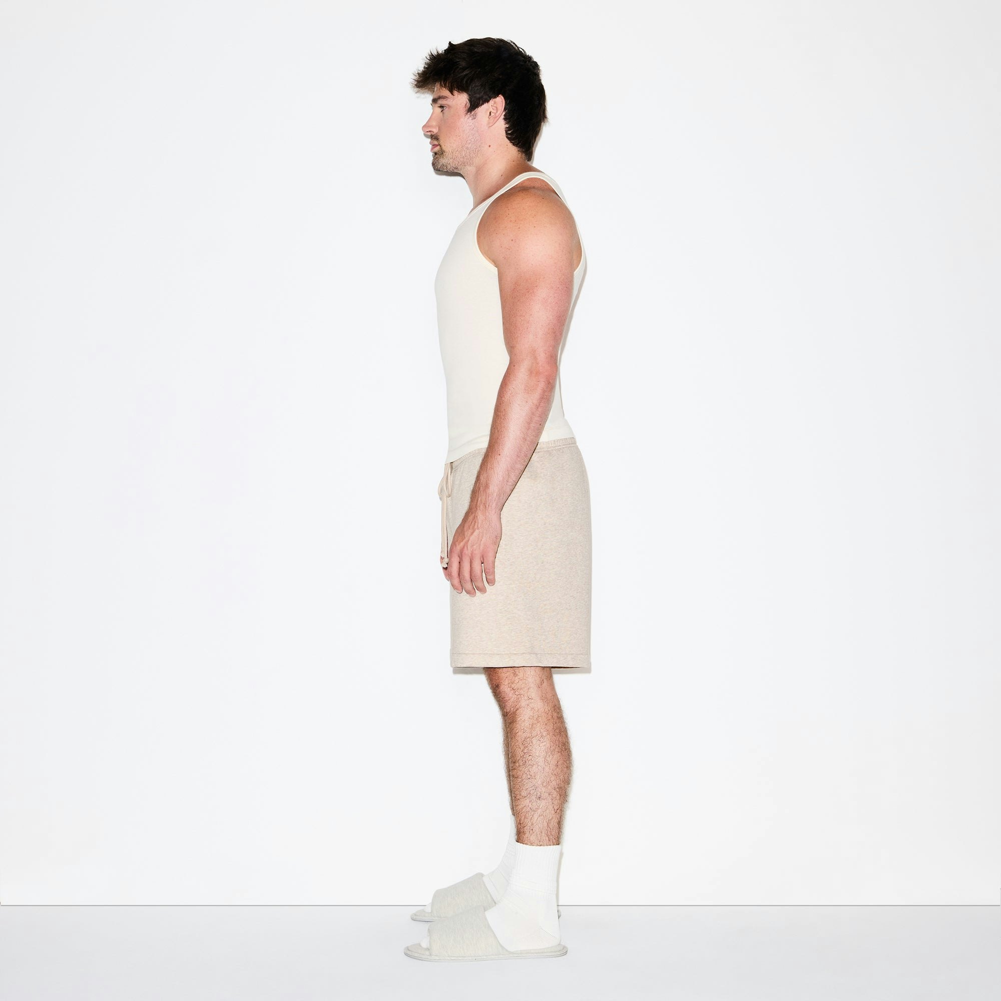 FLEECE LOUNGE MENS RELAXED SHORT | DESERT HEATHER ON A MODEL FRONT VIEW @ | FOCUS: 0.0, 1.0, 0.9