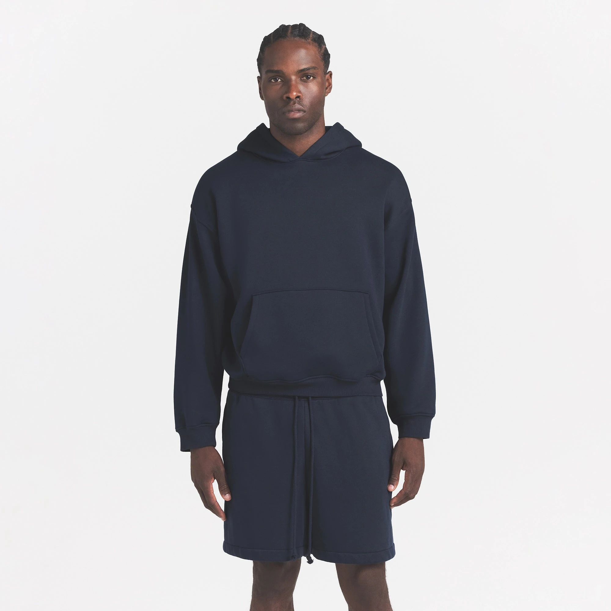 FLEECE LOUNGE MENS RELAXED SHORT | NAVY ON A MODEL FRONT VIEW @ | FOCUS: 0.0, 1.0, 0.9