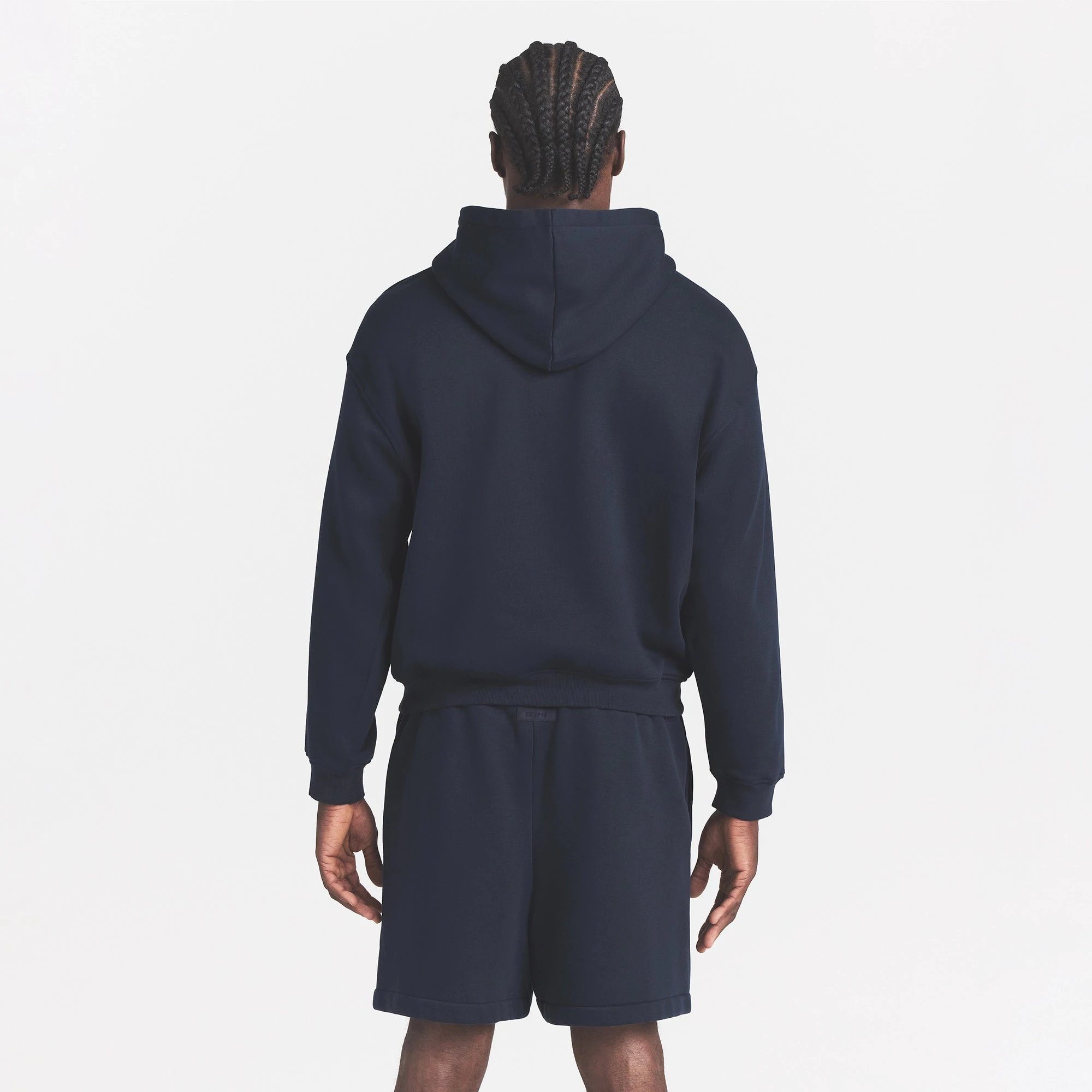 FLEECE LOUNGE MENS RELAXED SHORT | NAVY ON A MODEL BACK VIEW @ | FOCUS: 0.0, 1.0, 0.9