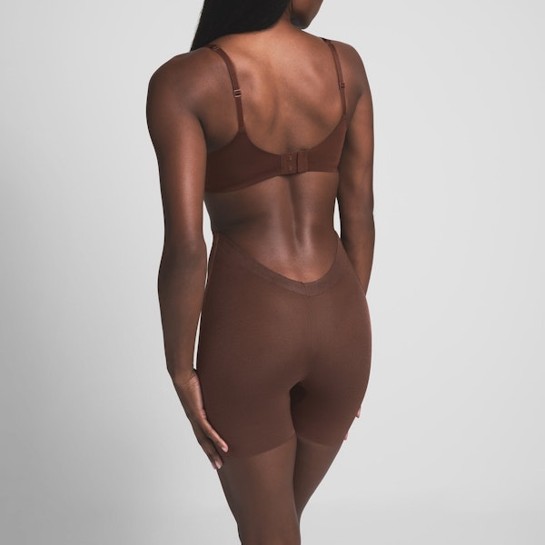 SHEER SCULPT LOW BACK SHORT | COCOA ON A MODEL BACK VIEW