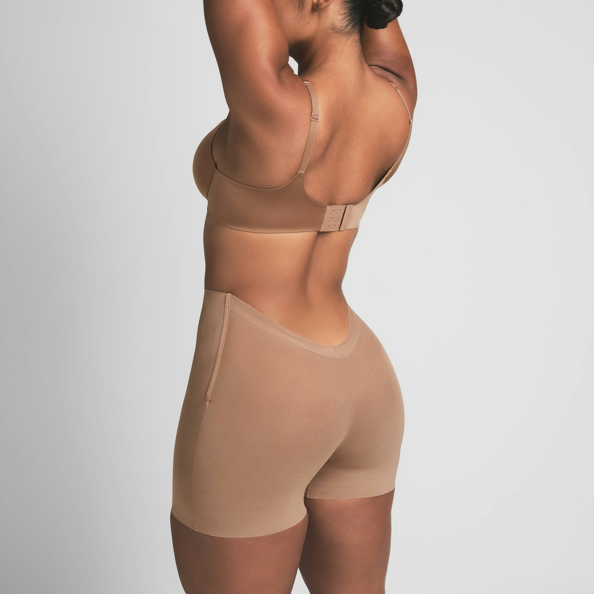 SHEER SCULPT LOW BACK SHORT | SIENNA ON A MODEL BACK VIEW