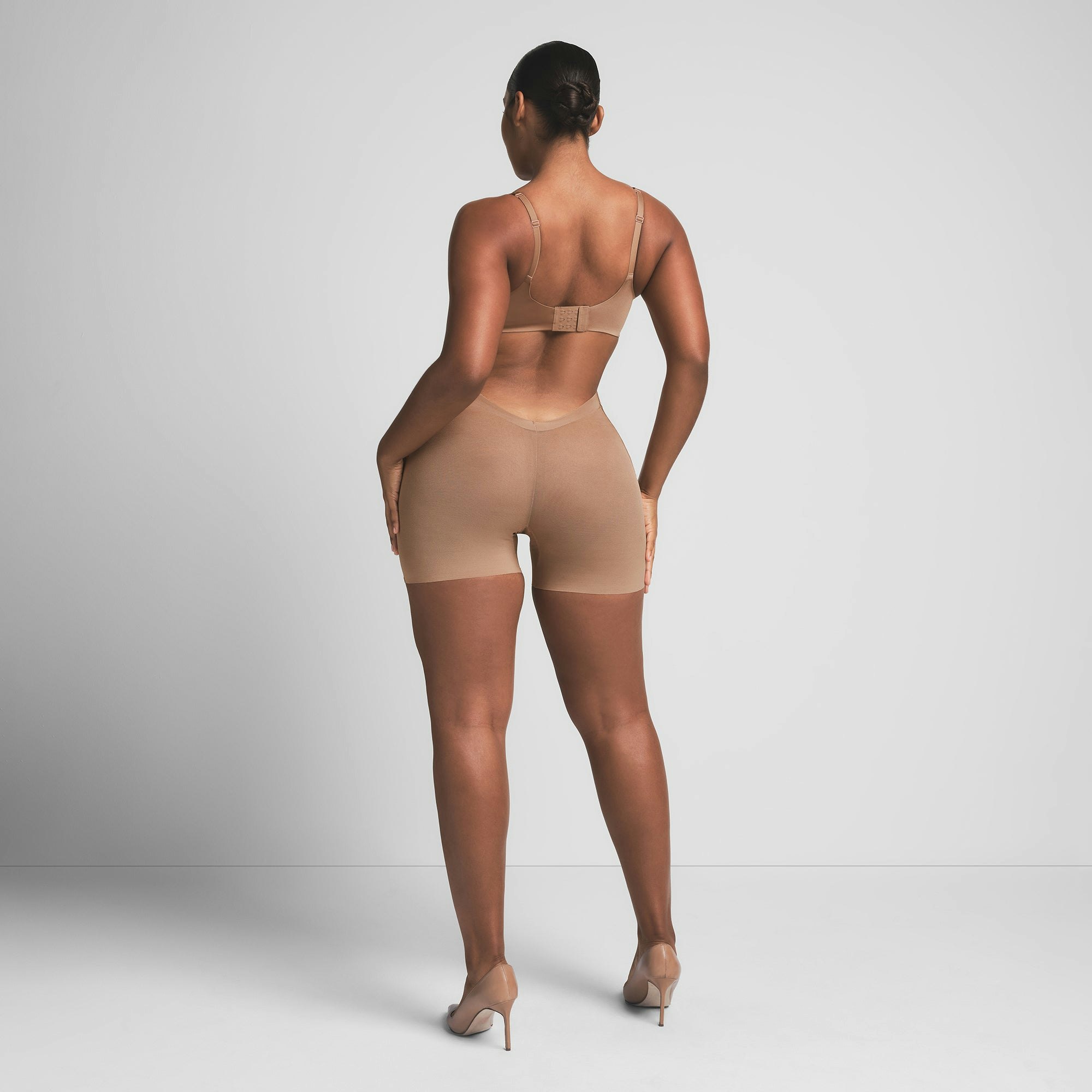SHEER SCULPT LOW BACK SHORT | SIENNA ON A MODEL BACK VIEW