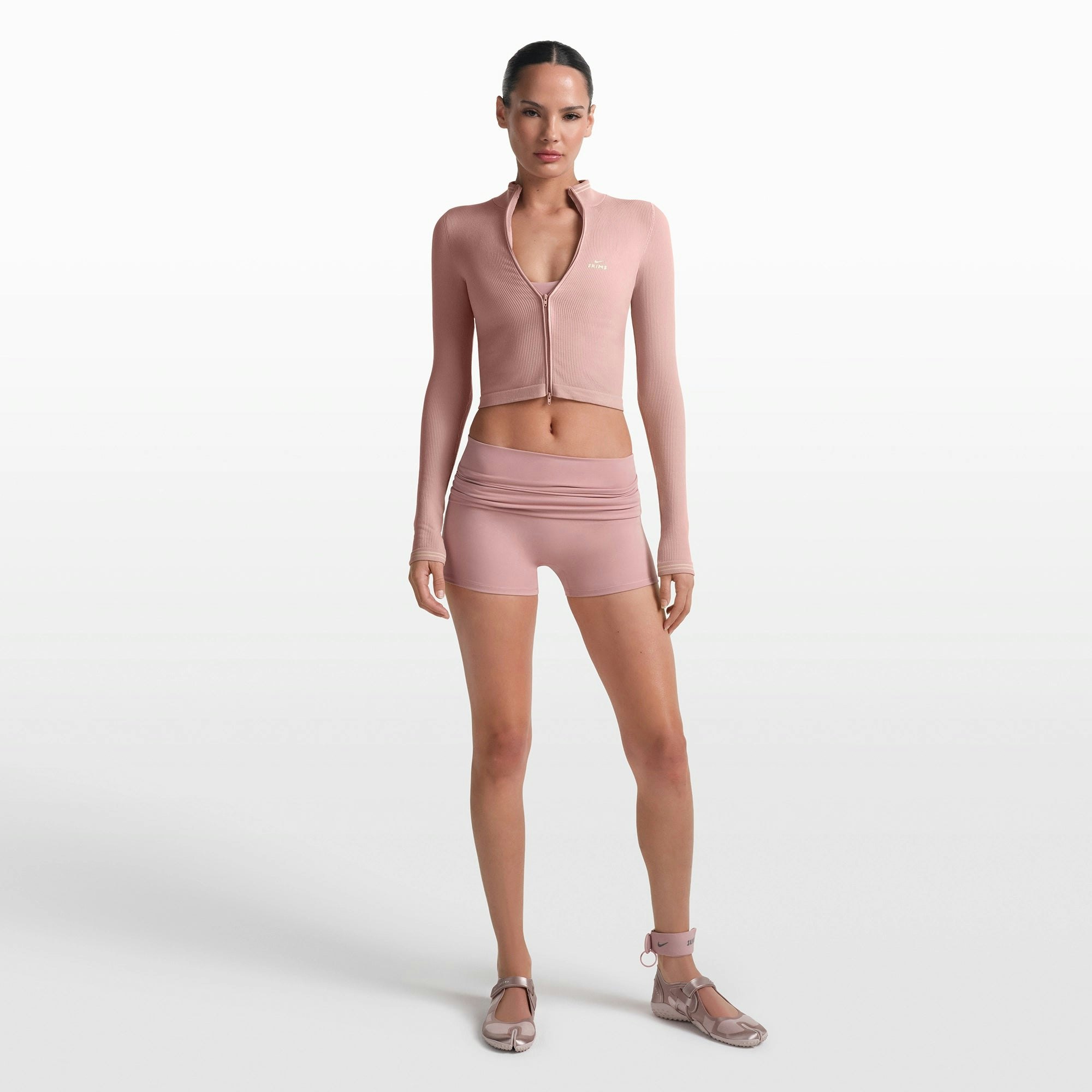 NikeSKIMS MATTE 3" FOLDOVER SHORT | HIMALAYAN ON A MODEL FRONT VIEW