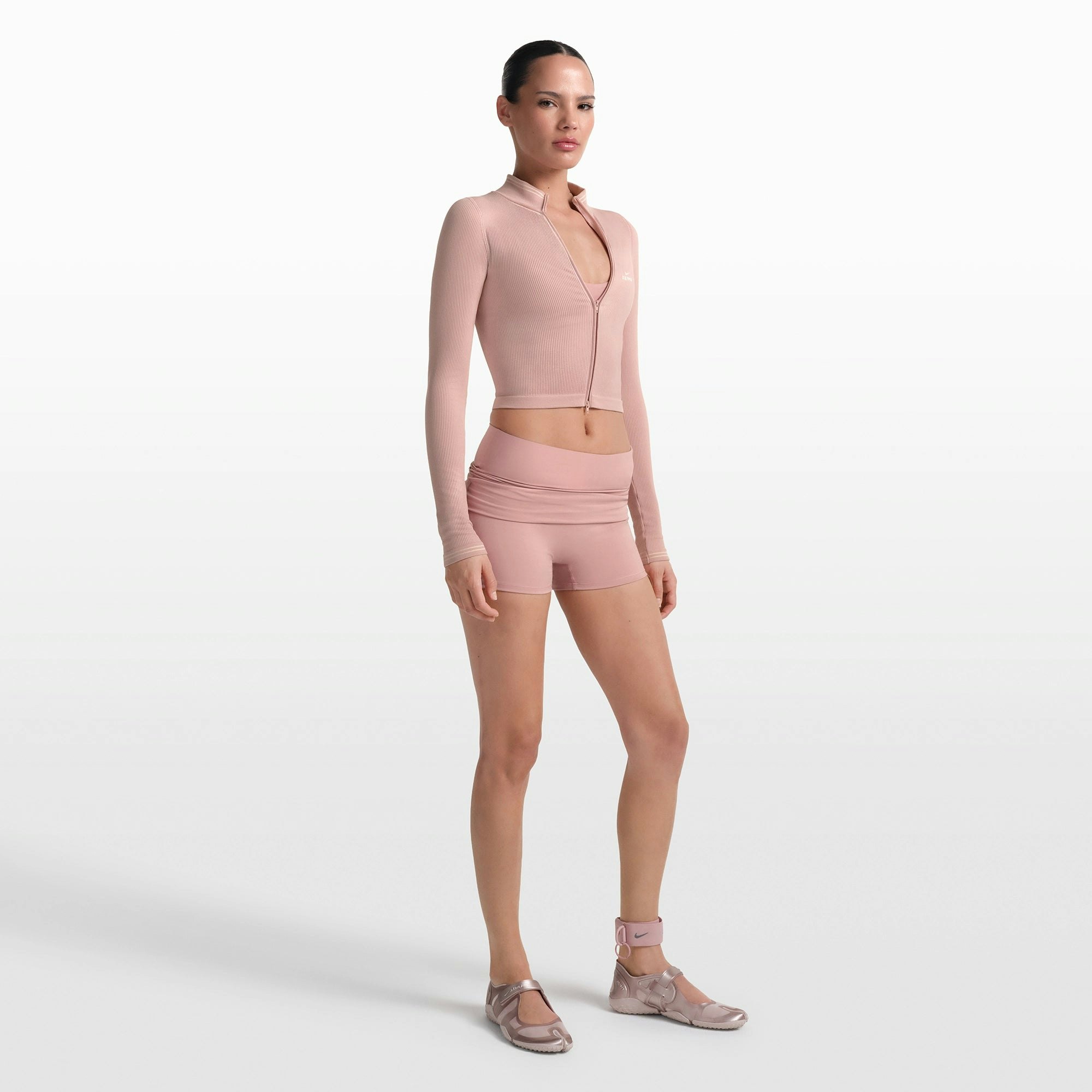 NikeSKIMS MATTE 3" FOLDOVER SHORT | HIMALAYAN ON A MODEL FRONT VIEW @ | FOCUS: 0.0, 1.0, 0.9