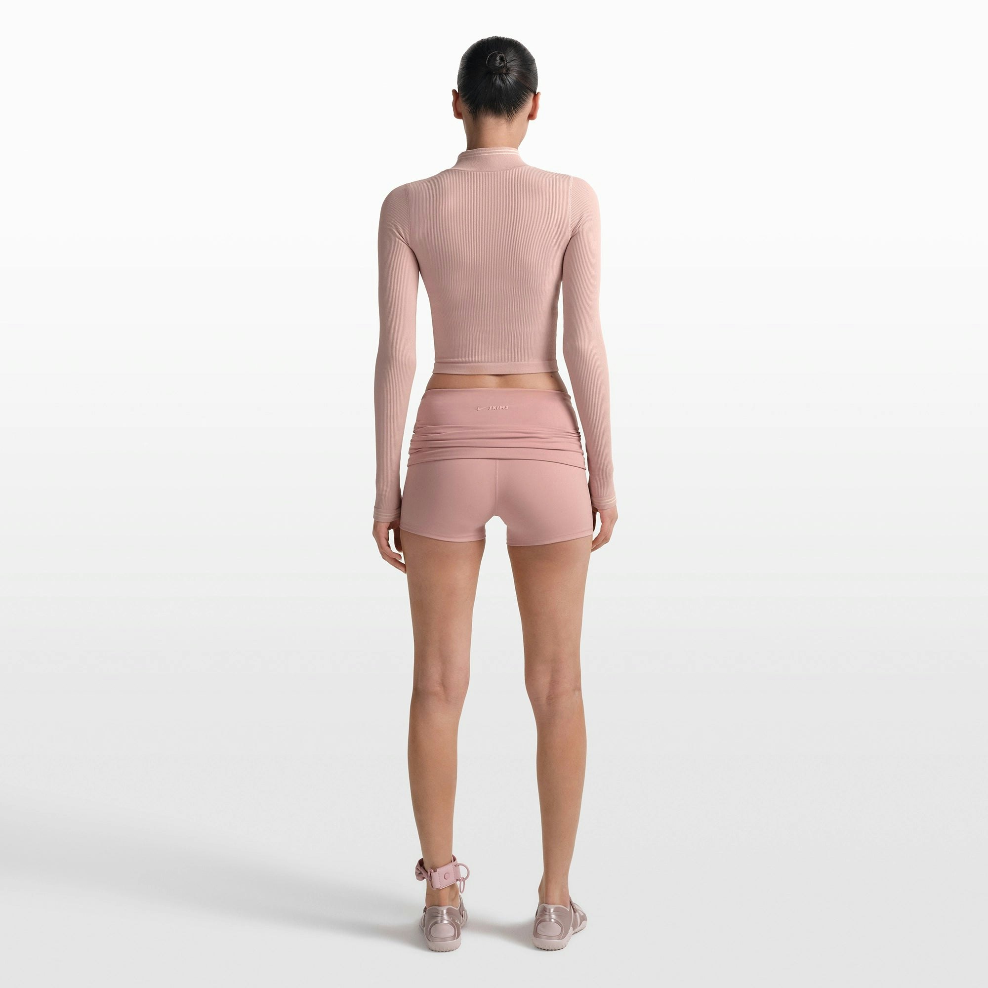 NikeSKIMS MATTE 3" FOLDOVER SHORT | HIMALAYAN ON A MODEL FRONT VIEW @ | FOCUS: 0.0, 1.0, 0.9