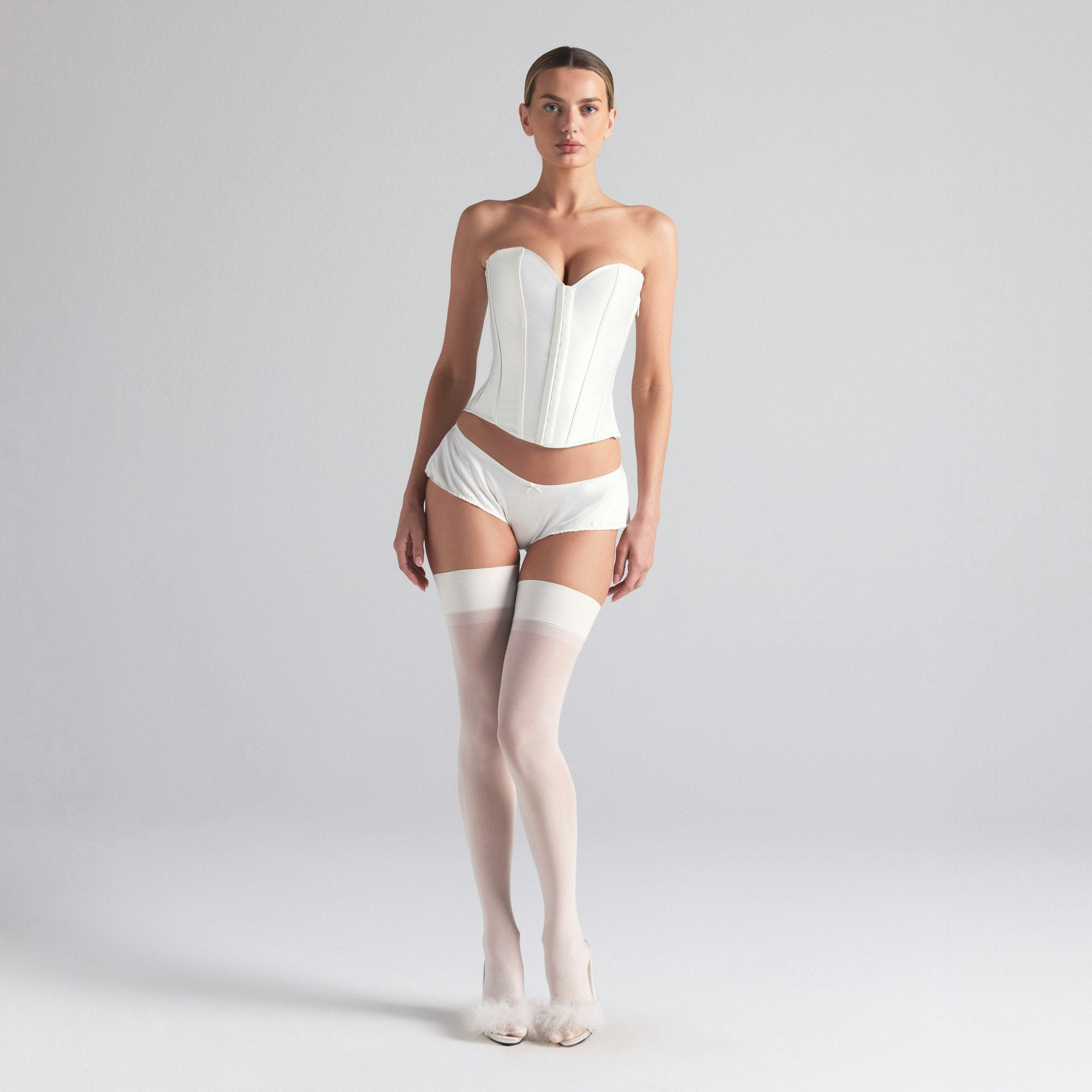 WOVEN SHINE TAP SHORT | IVORY ON A MODEL FRONT  ON A MODEL FRONT VIEW | FOCUS: 0.0, 1.0, 0.9