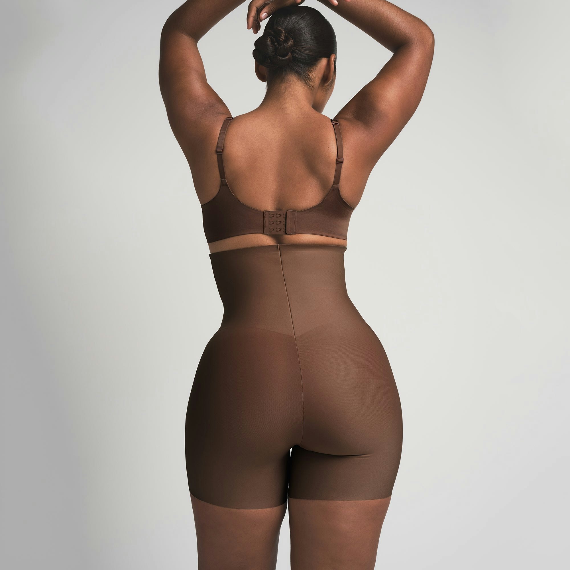 SKIMS BODY CORE SCULPT HIGH-WAISTED SHORT | JASPER ON A MODEL BACK VIEW @ | FOCUS: 0.0, 1.0, 0.9