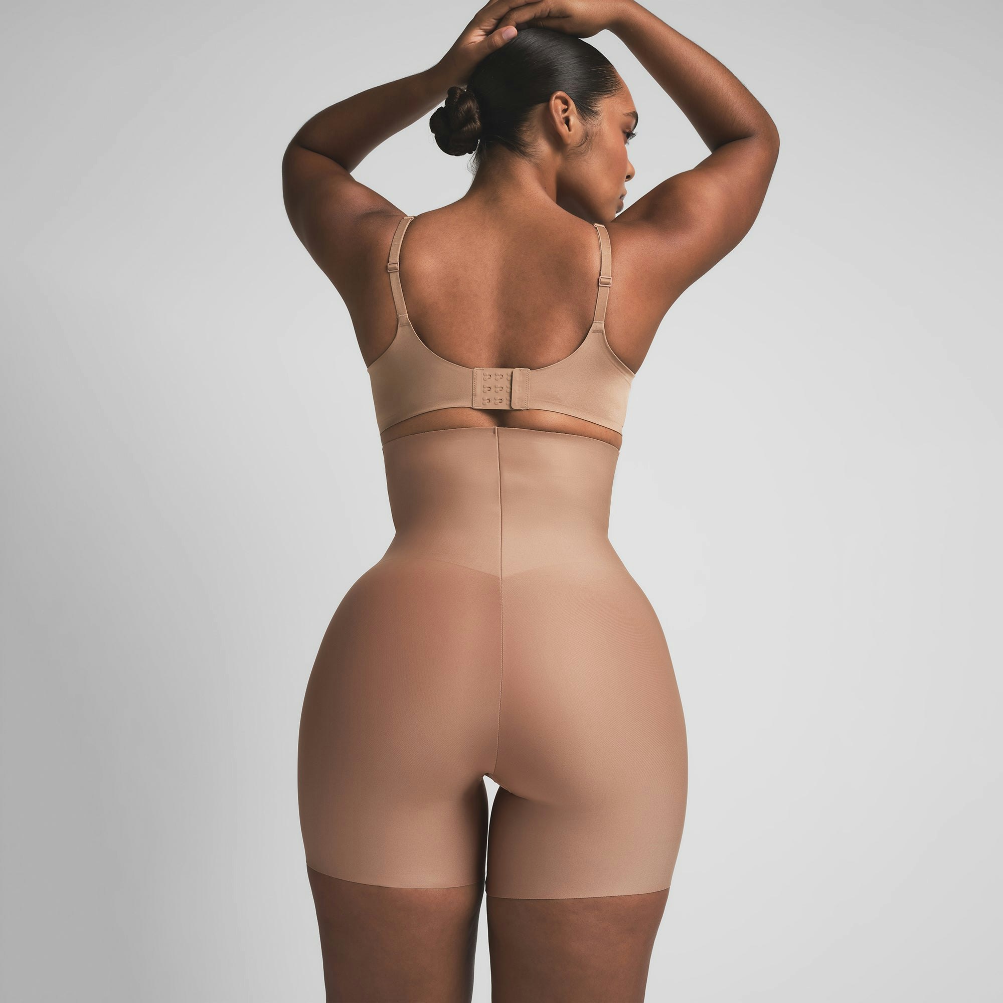 SKIMS BODY CORE SCULPT HIGH-WAISTED SHORT | SIENNA ON A MODEL BACK VIEW | FOCUS: 0.0, 1.0, 0.9