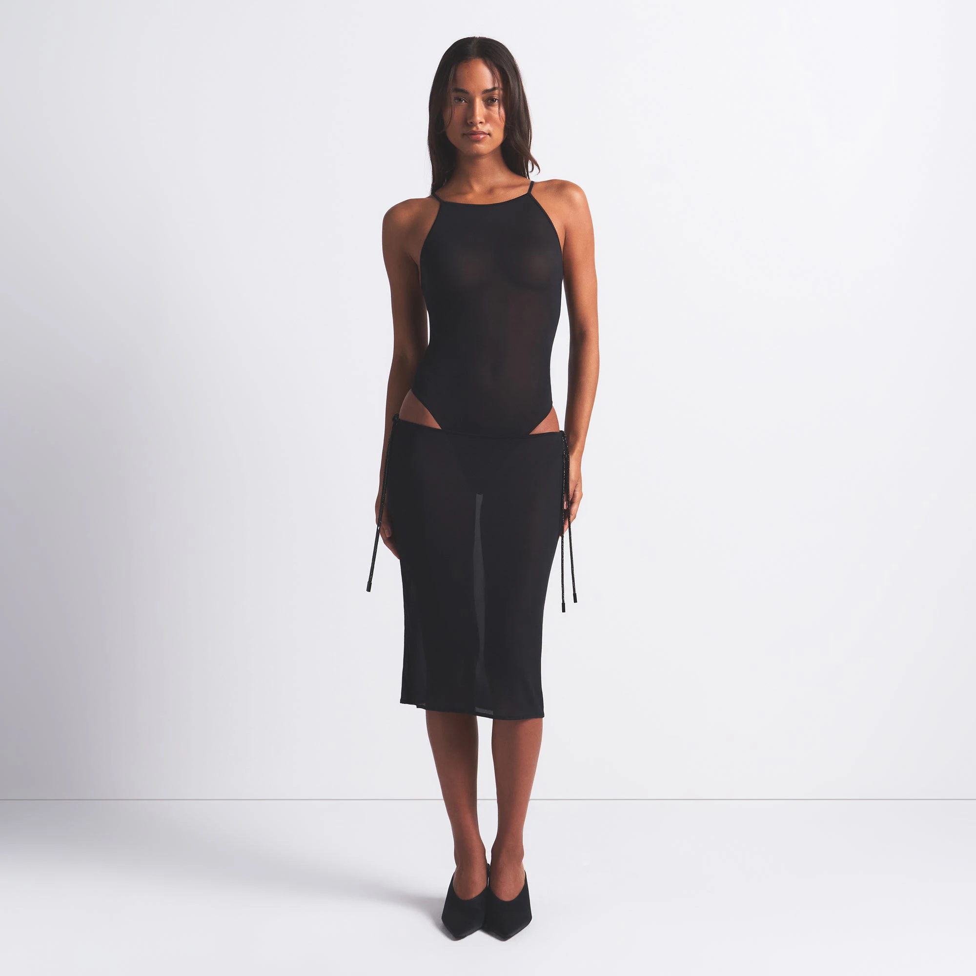 RHINESTONE KNIT TIE SIDE MIDI SKIRT | ONYX ON A MODEL FRONT VIEW @ | FOCUS: 0.0, 1.0, 0.9